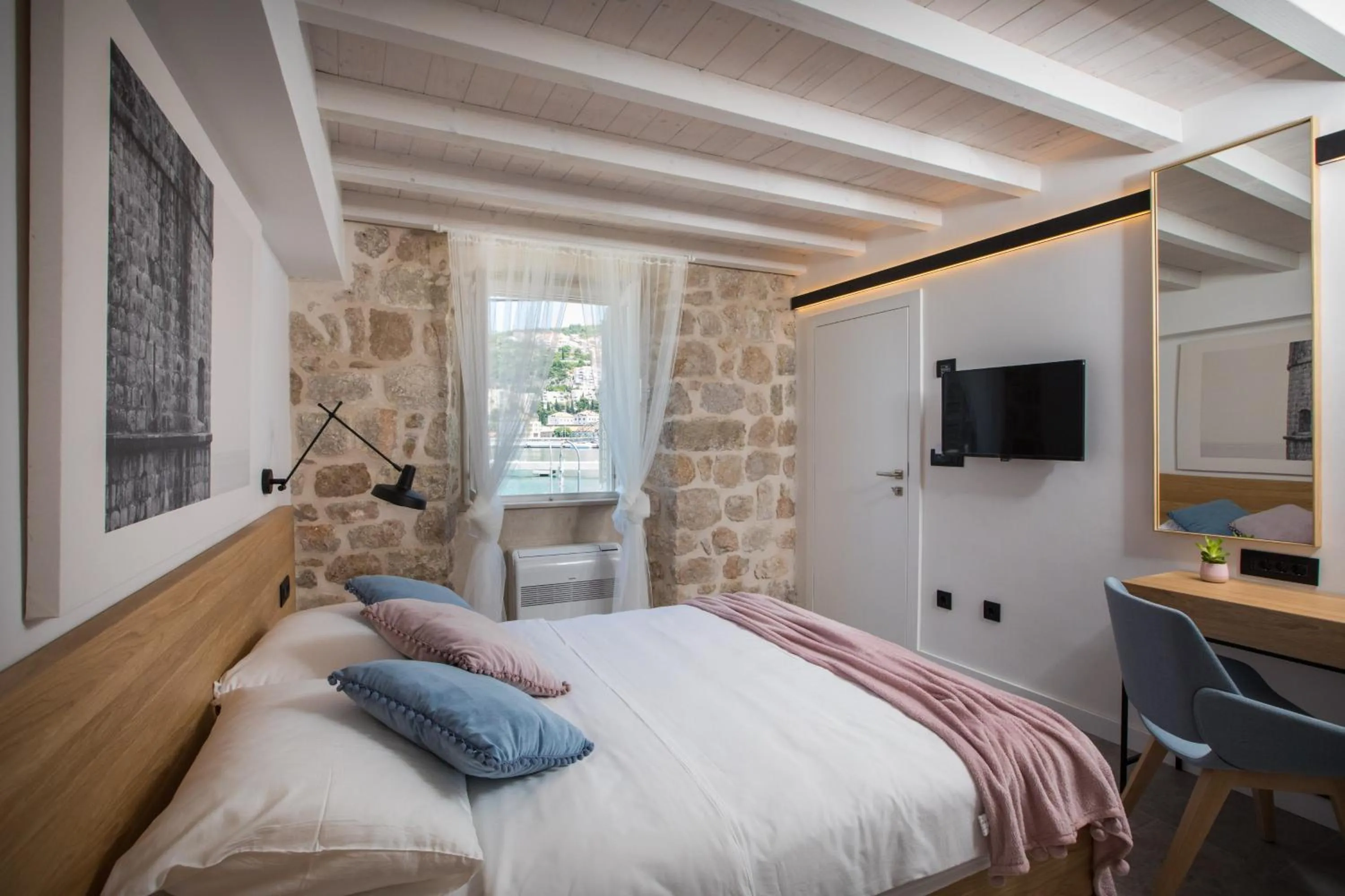 Bed in Bova Luxury Rooms