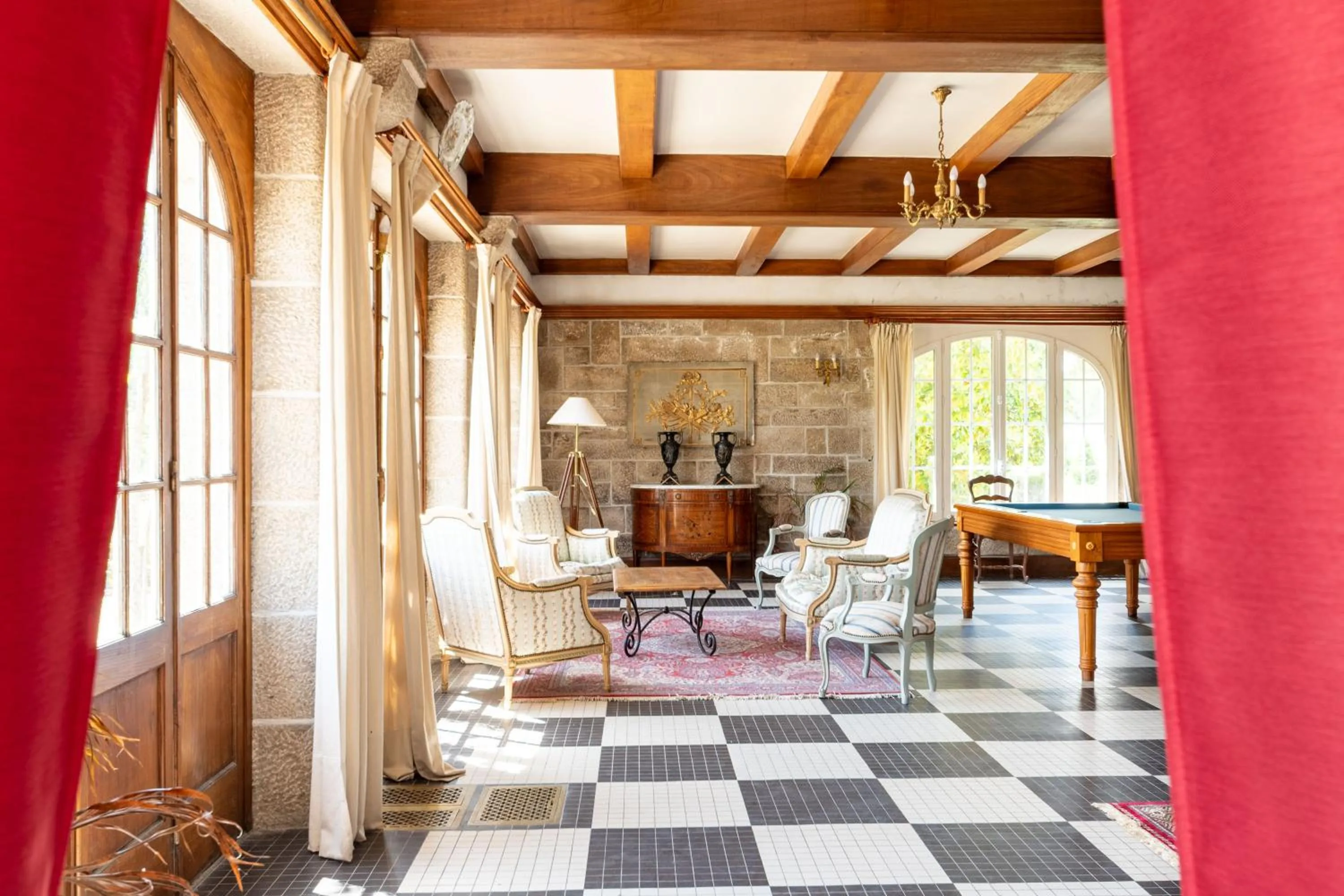 Communal lounge/ TV room in Manoir Du Stang