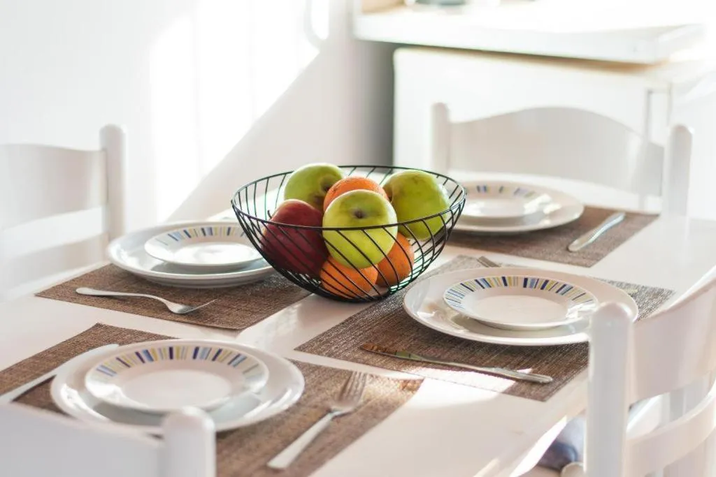 Dining area in Sandy Beach Complex - Poolside Studios & Seaside Apartments