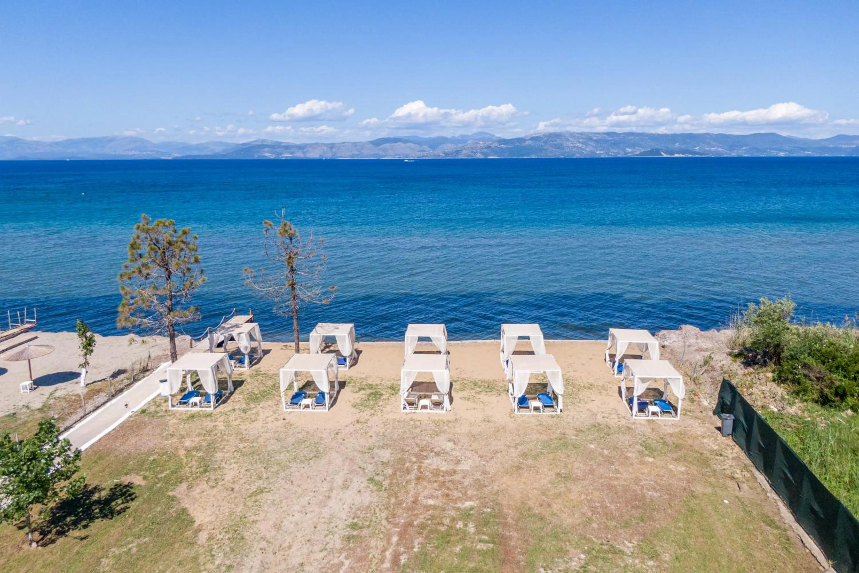 Day in Sandy Beach Complex - Poolside Studios & Seaside Apartments