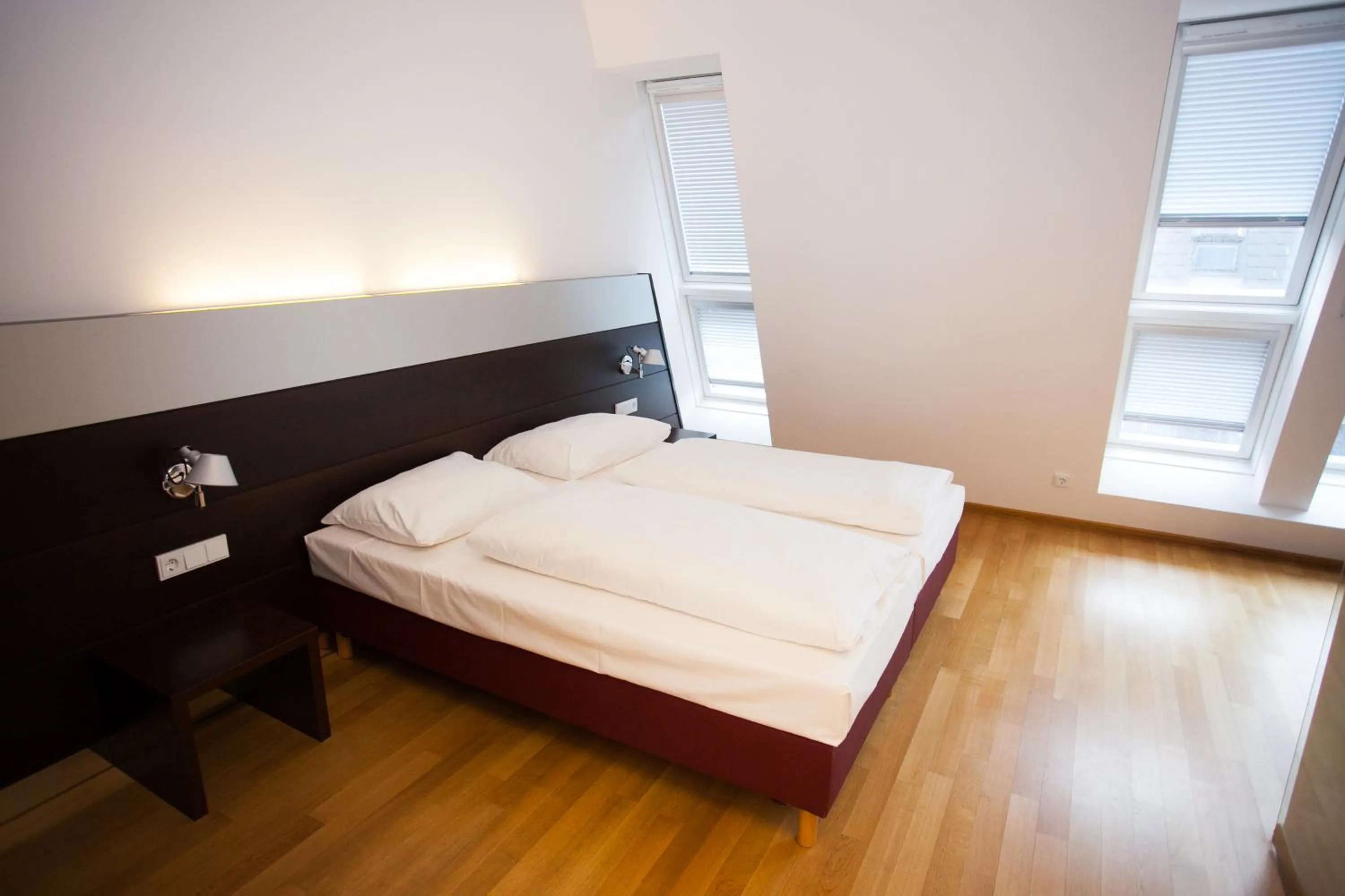 Bed in Hotel Schwarzer Bär