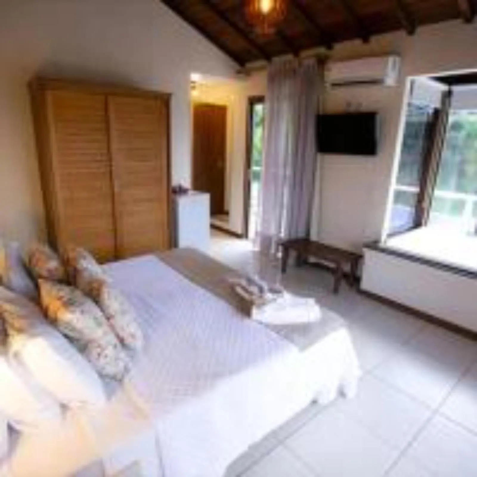 Bed in Pousada Amancay