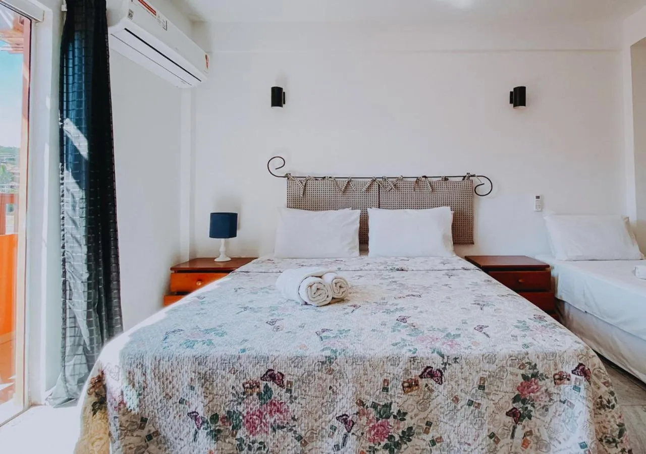 Bed in Calador Búzios Hotel
