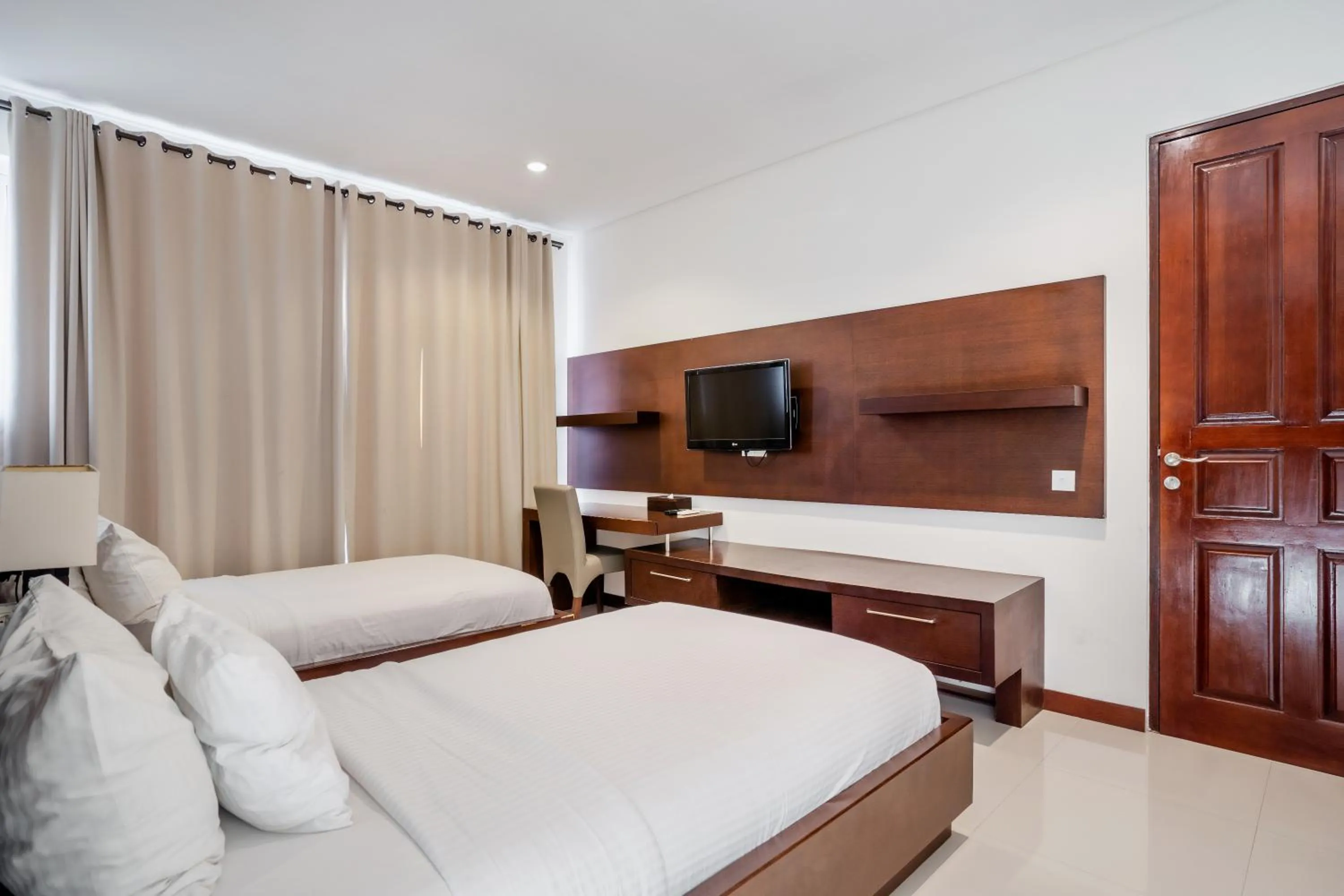 Bed in Danoya Private Luxury Residences