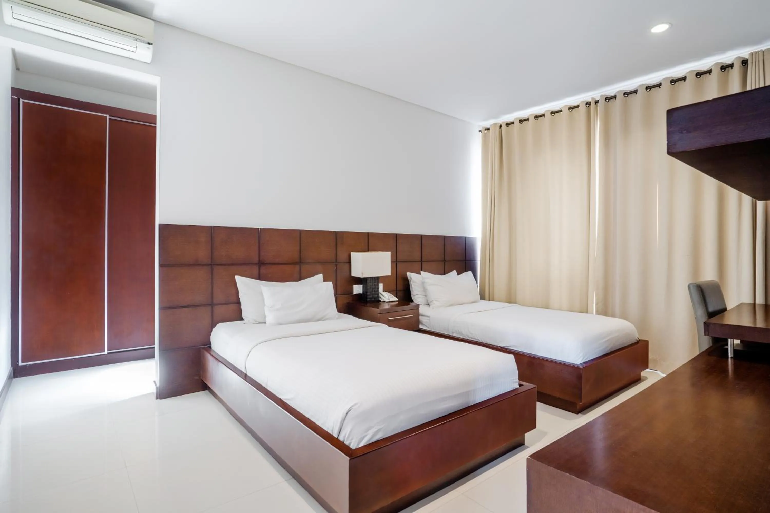 Bed in Danoya Private Luxury Residences