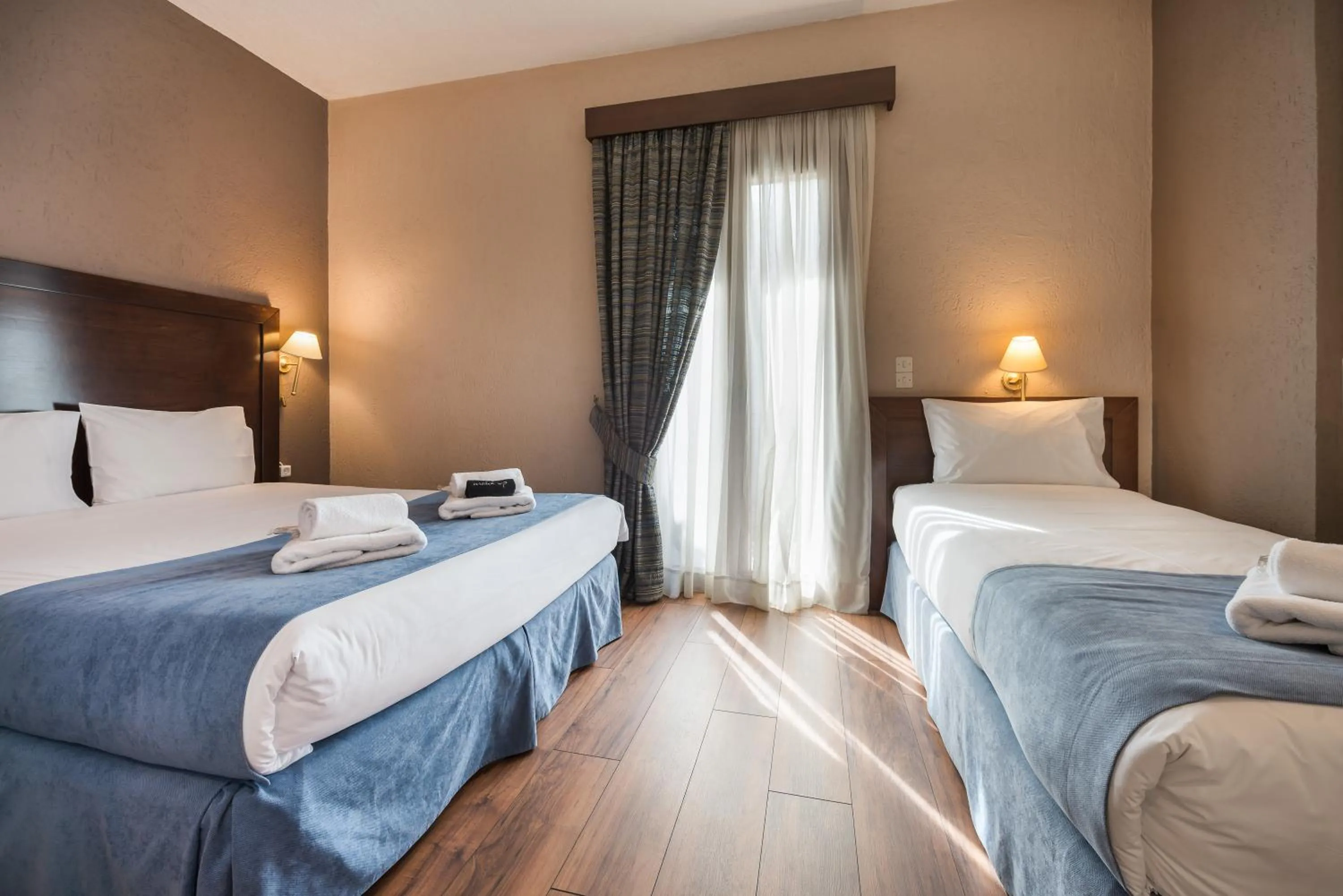 Bedroom, Bed in Arahova Inn Hotel