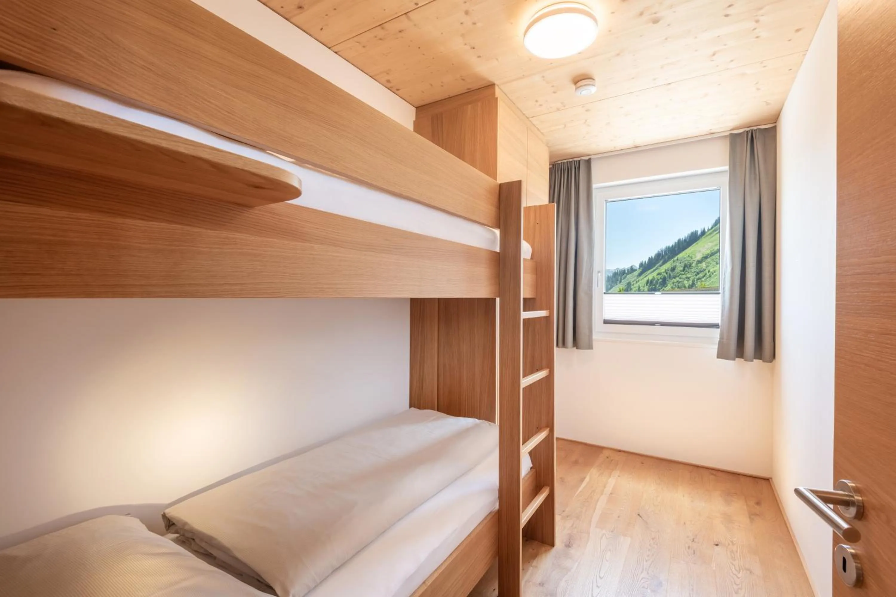 Photo of the whole room, Bed in Rössle Appartements und Sport Rössle Skiverleih & Sportgeschäft