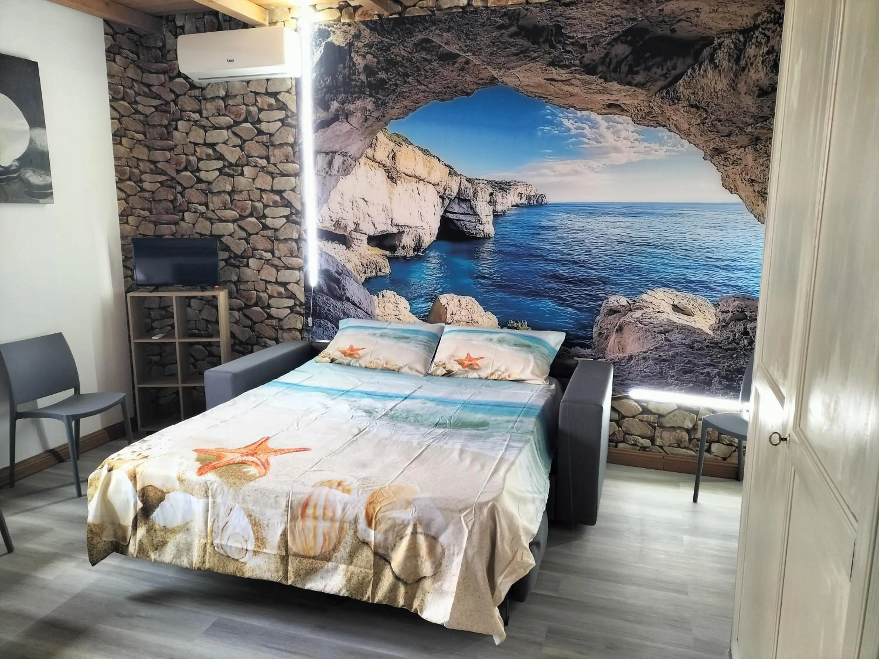 Photo of the whole room, Bed in The square