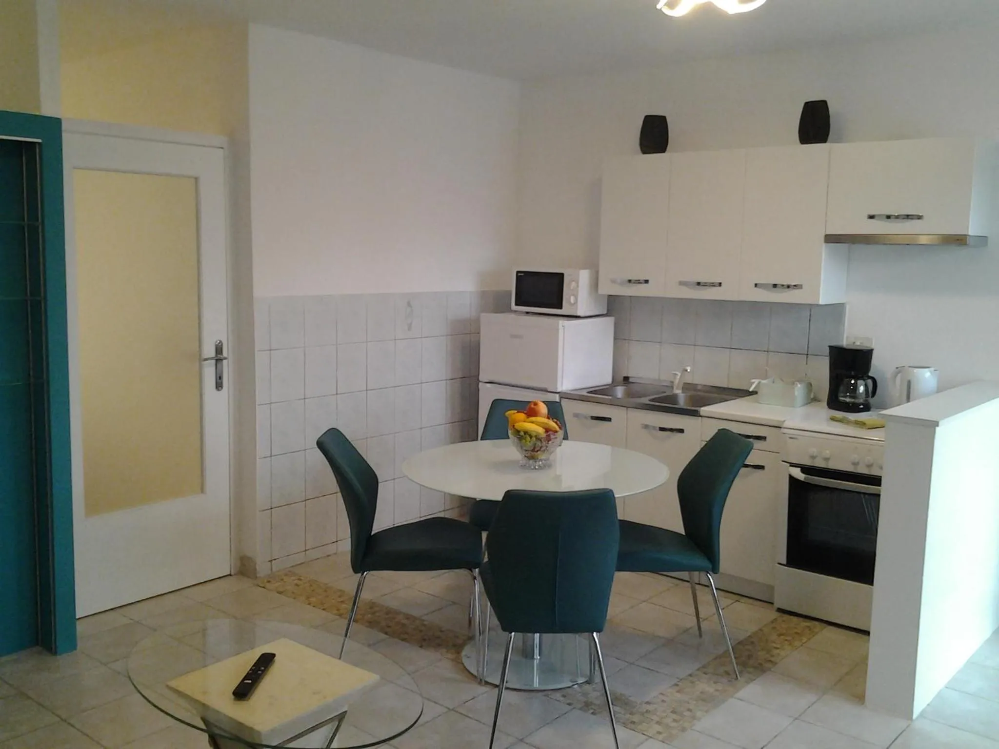 Kitchen or kitchenette in Apartments Darijana