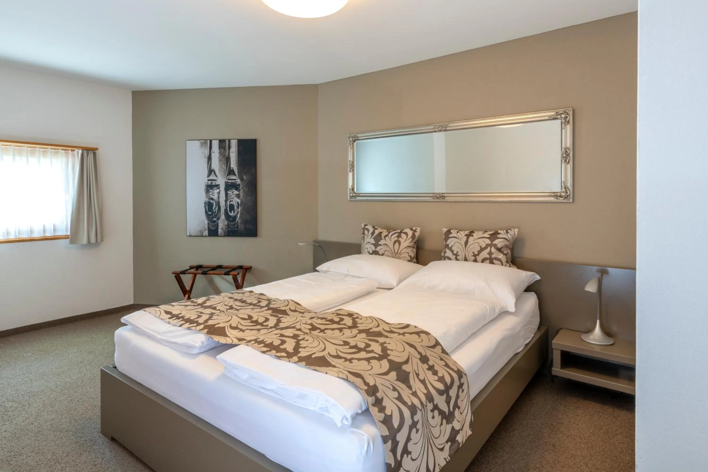 Bed in Hotel Allegra