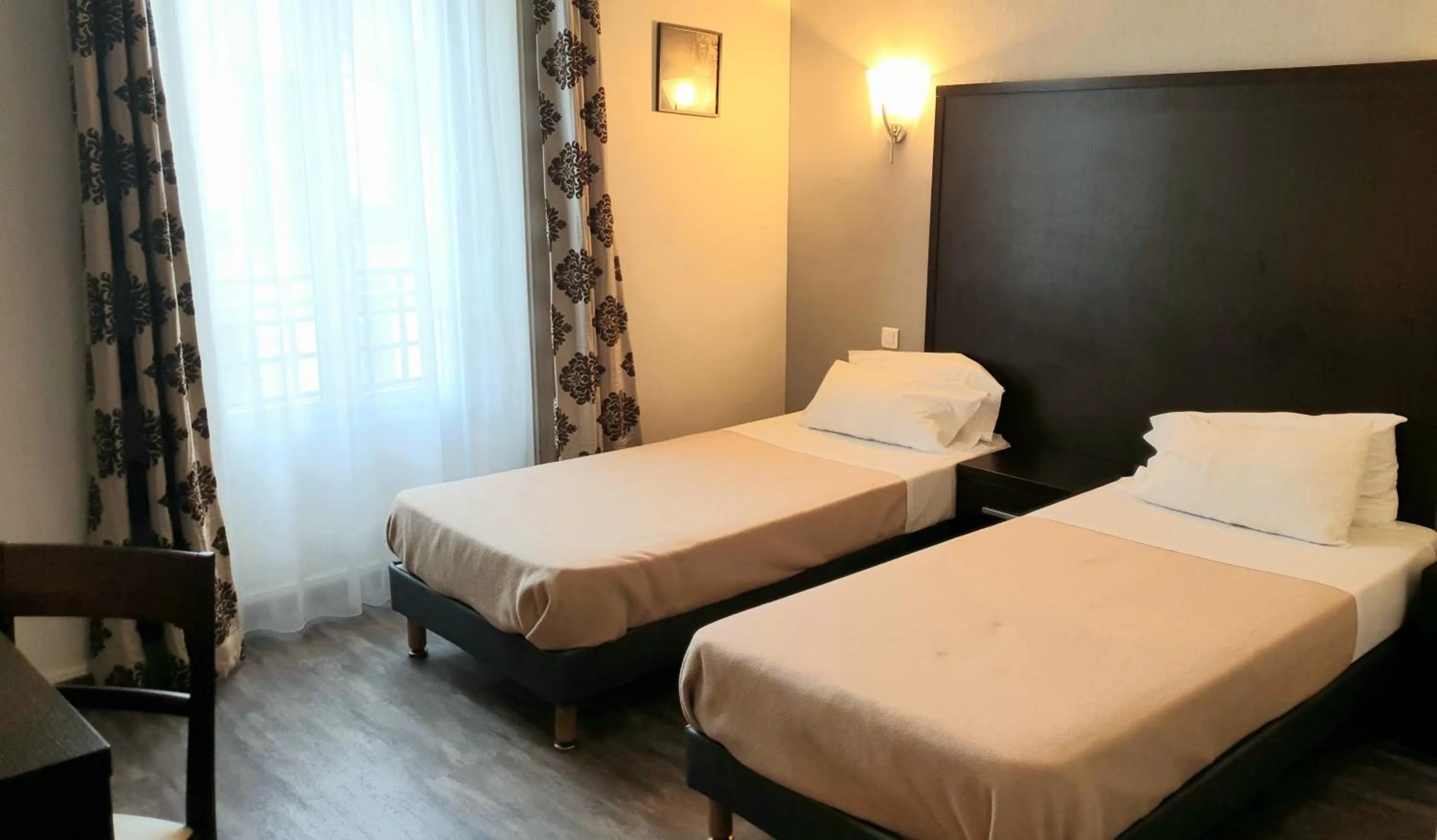 Photo of the whole room, Bed in Brit Hotel Confort Auclair