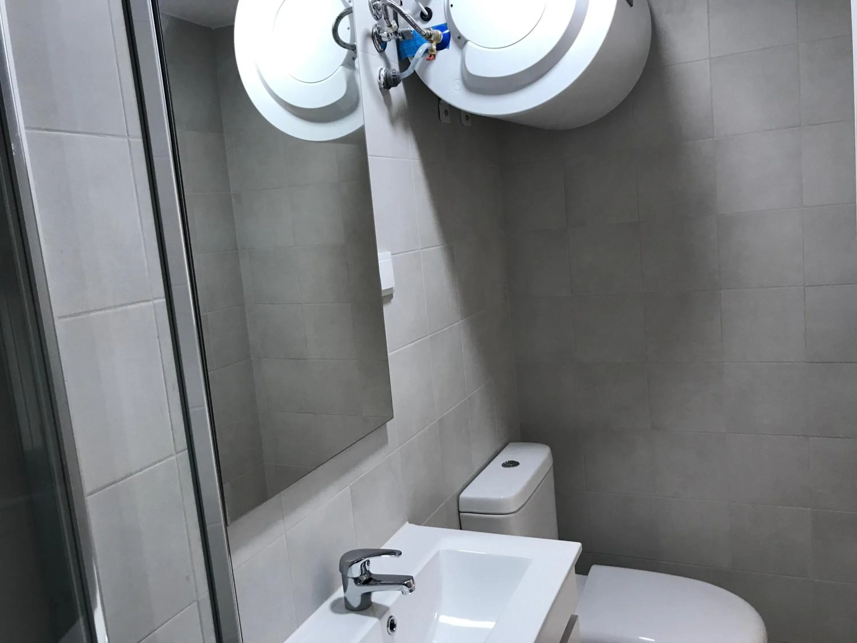 Bathroom in Apartments Center Alfama