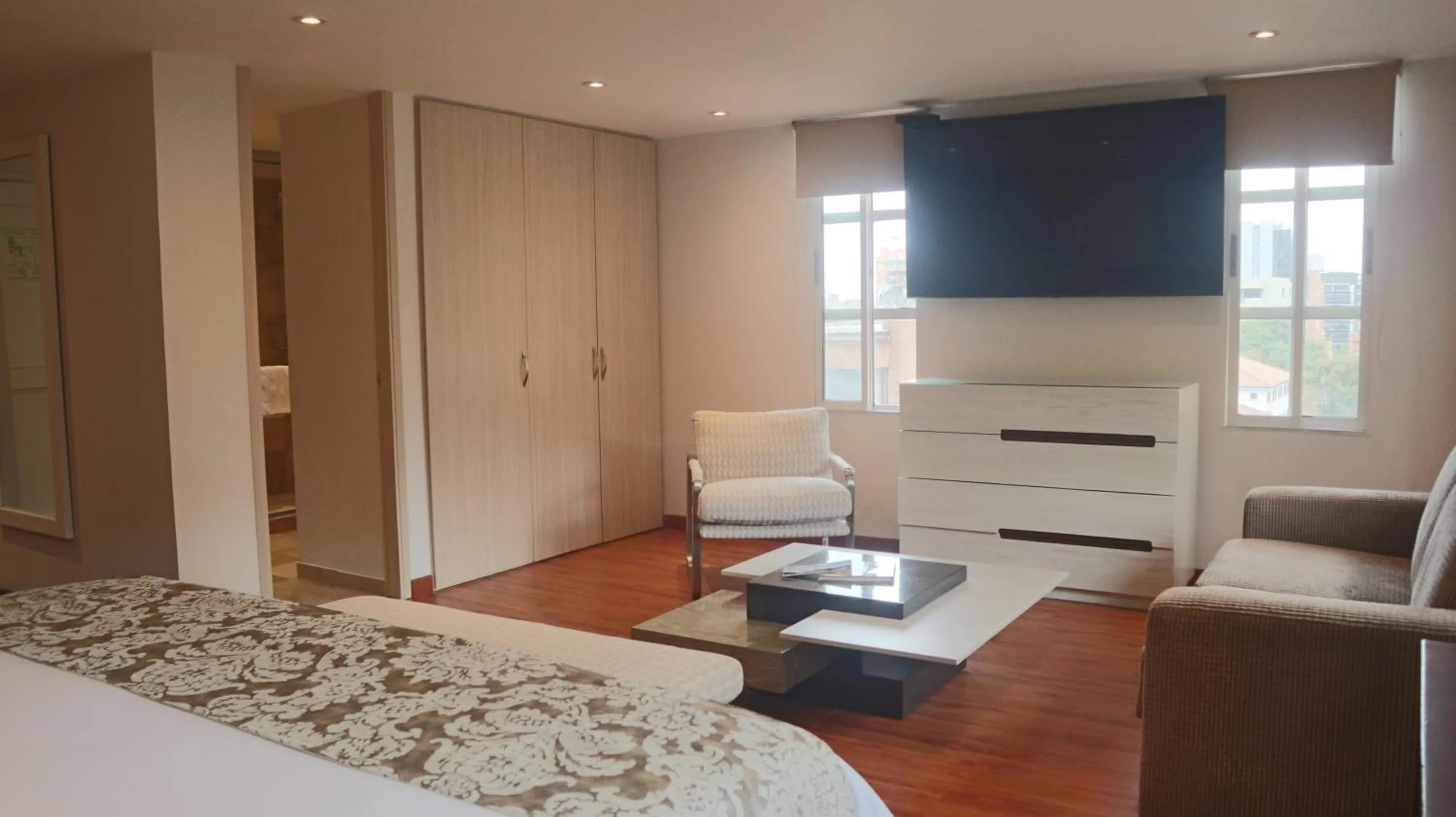 Living room, Bed in Hotel Portón de la Cabrera