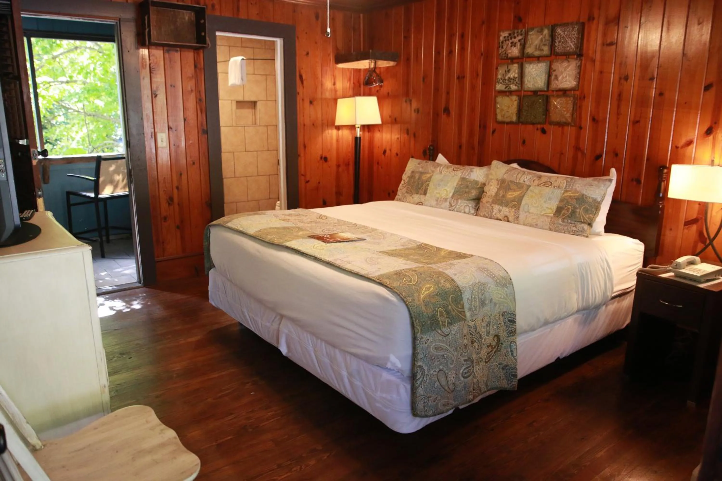 River view, Bed in Riverside Lodge at Chimney Rock