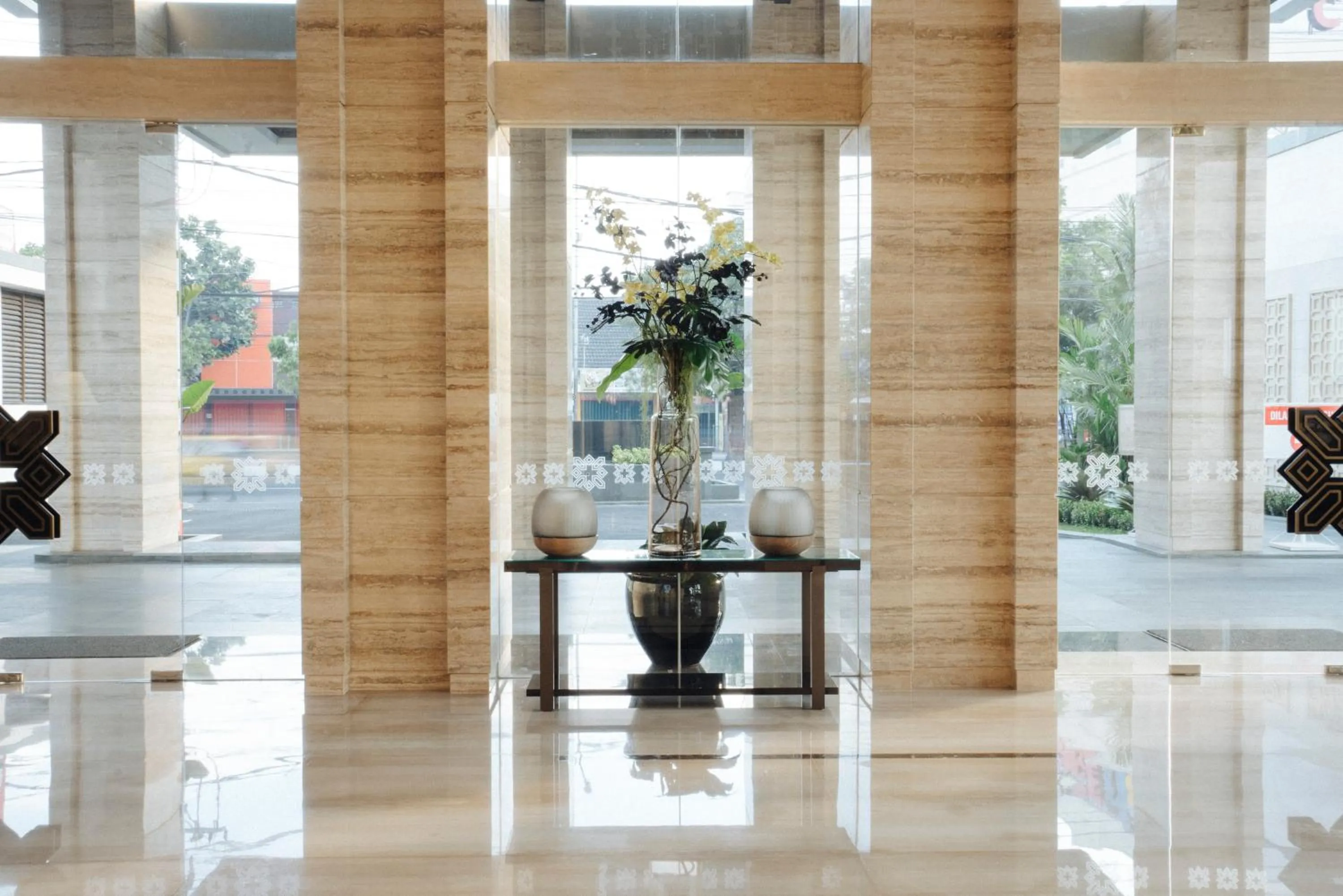 Lobby or reception in GRAMM HOTEL by Ambarrukmo Yogyakarta