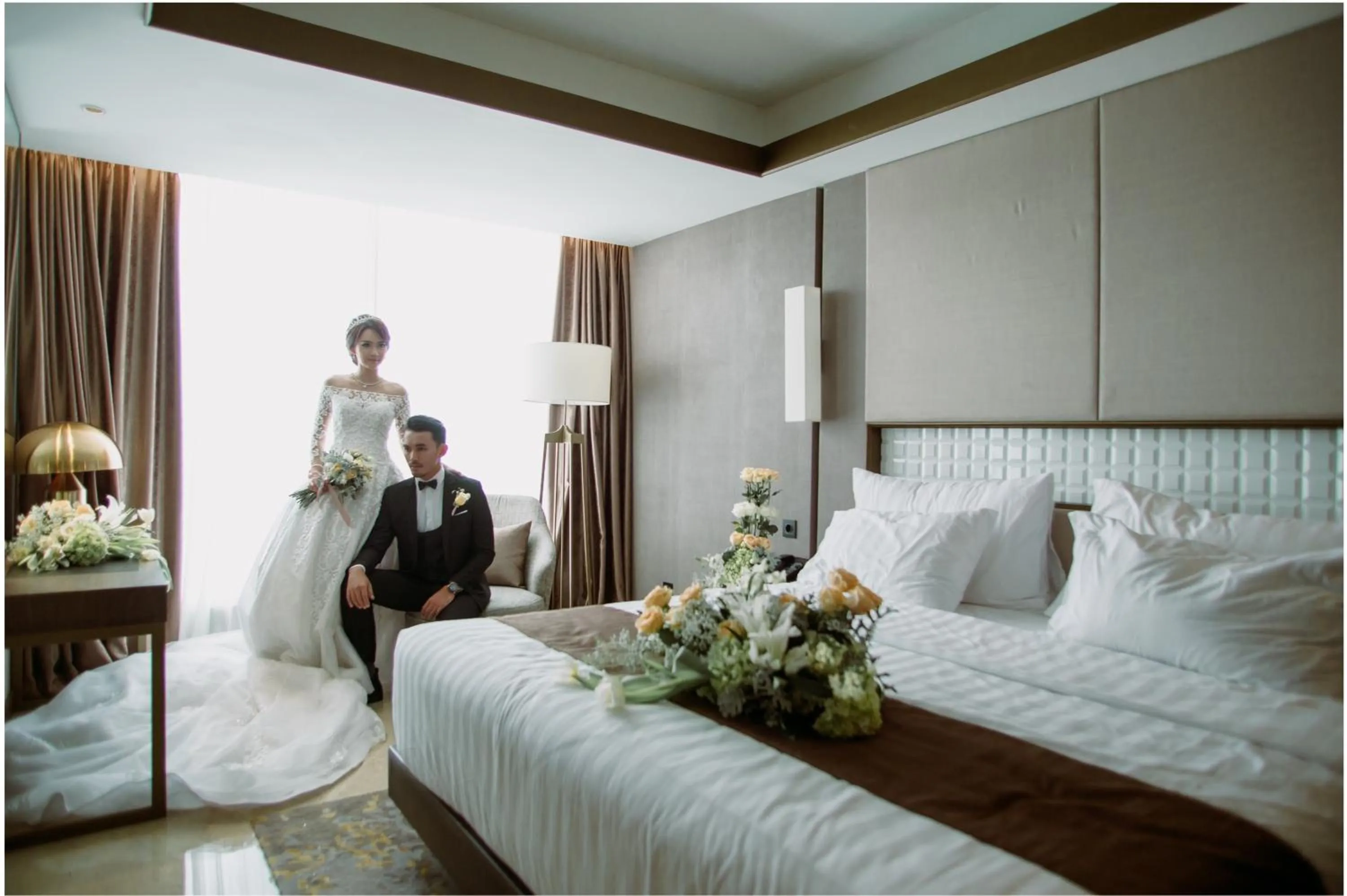 Bed in GRAMM HOTEL by Ambarrukmo Yogyakarta