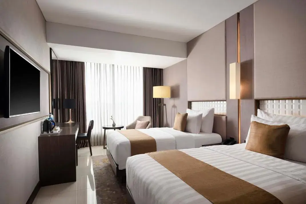 Deluxe Twin Room in GRAMM HOTEL by Ambarrukmo Yogyakarta Deluxe Twin Room in GRAMM HOTEL by Ambarrukmo Yogyakarta