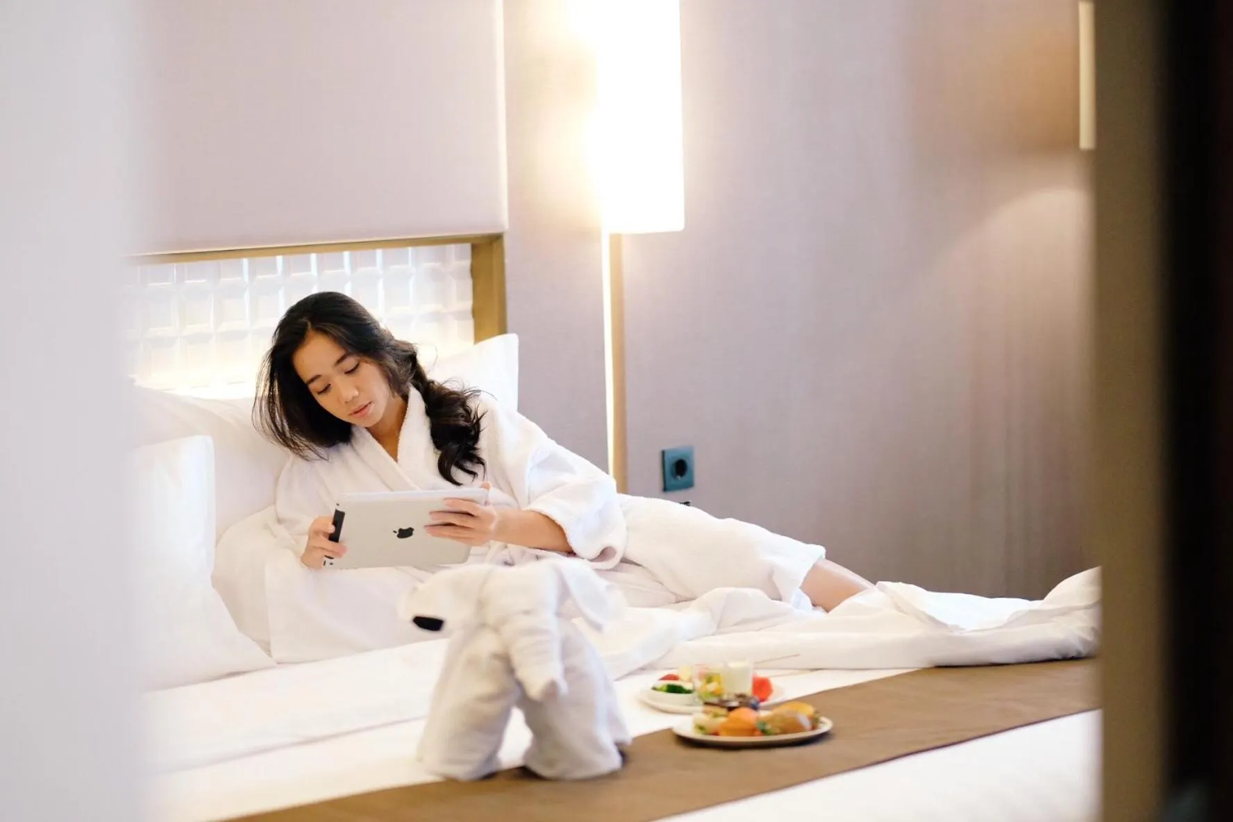 Bed in GRAMM HOTEL by Ambarrukmo Yogyakarta