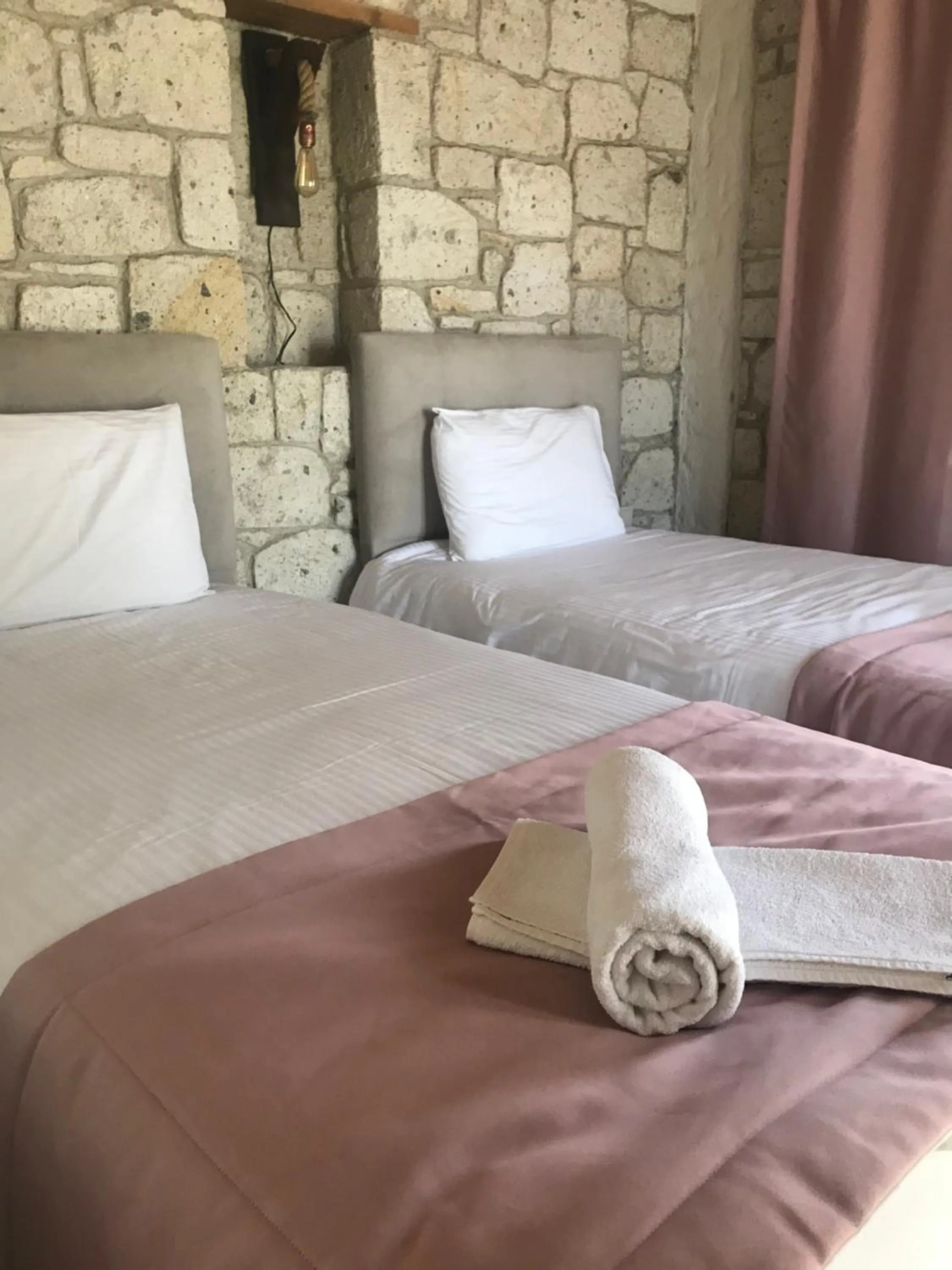 Bed in Çona Otel