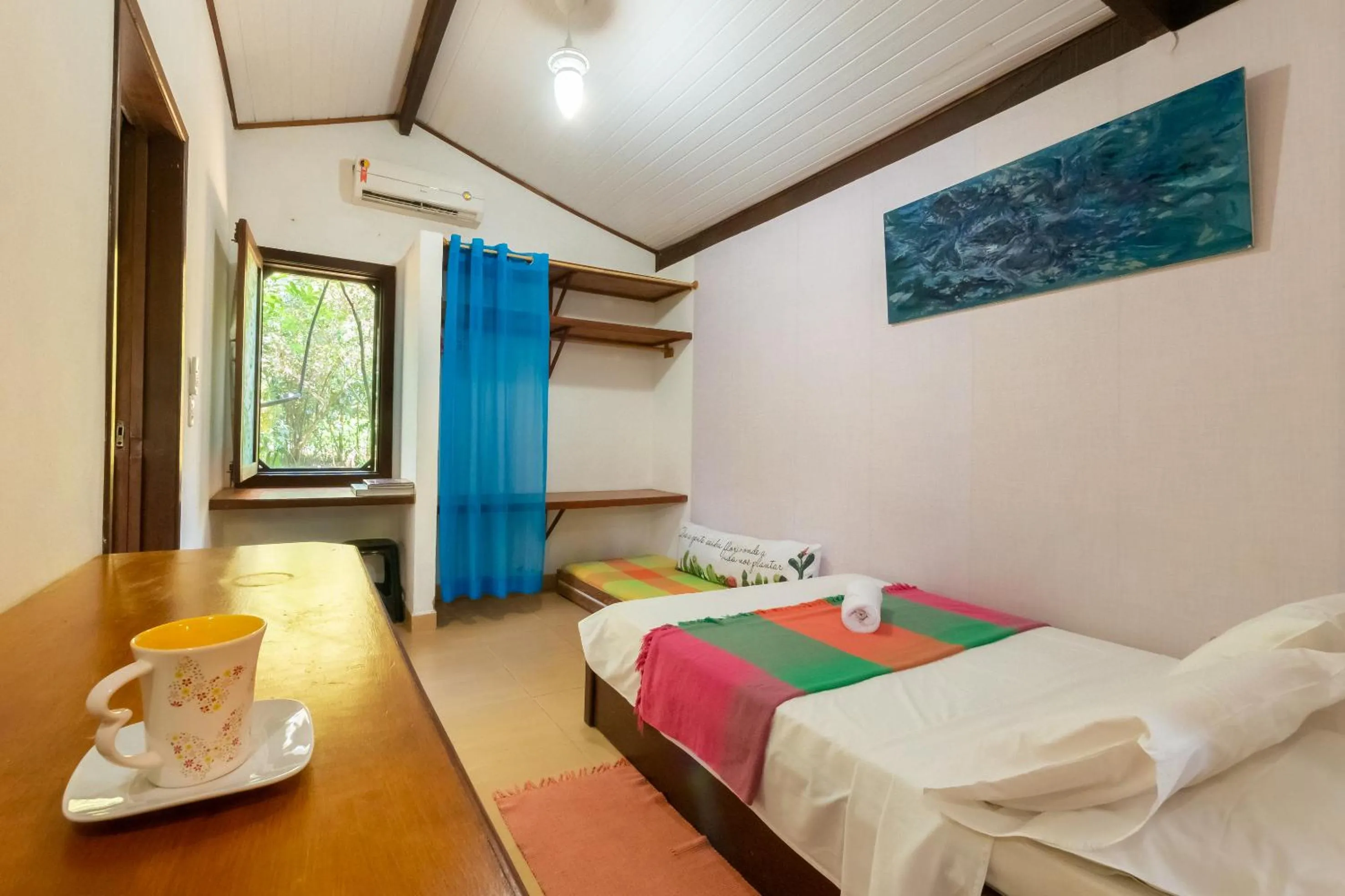 Bed in Recanto dos Pássaros Zen Apartamentos em meio de Natureza