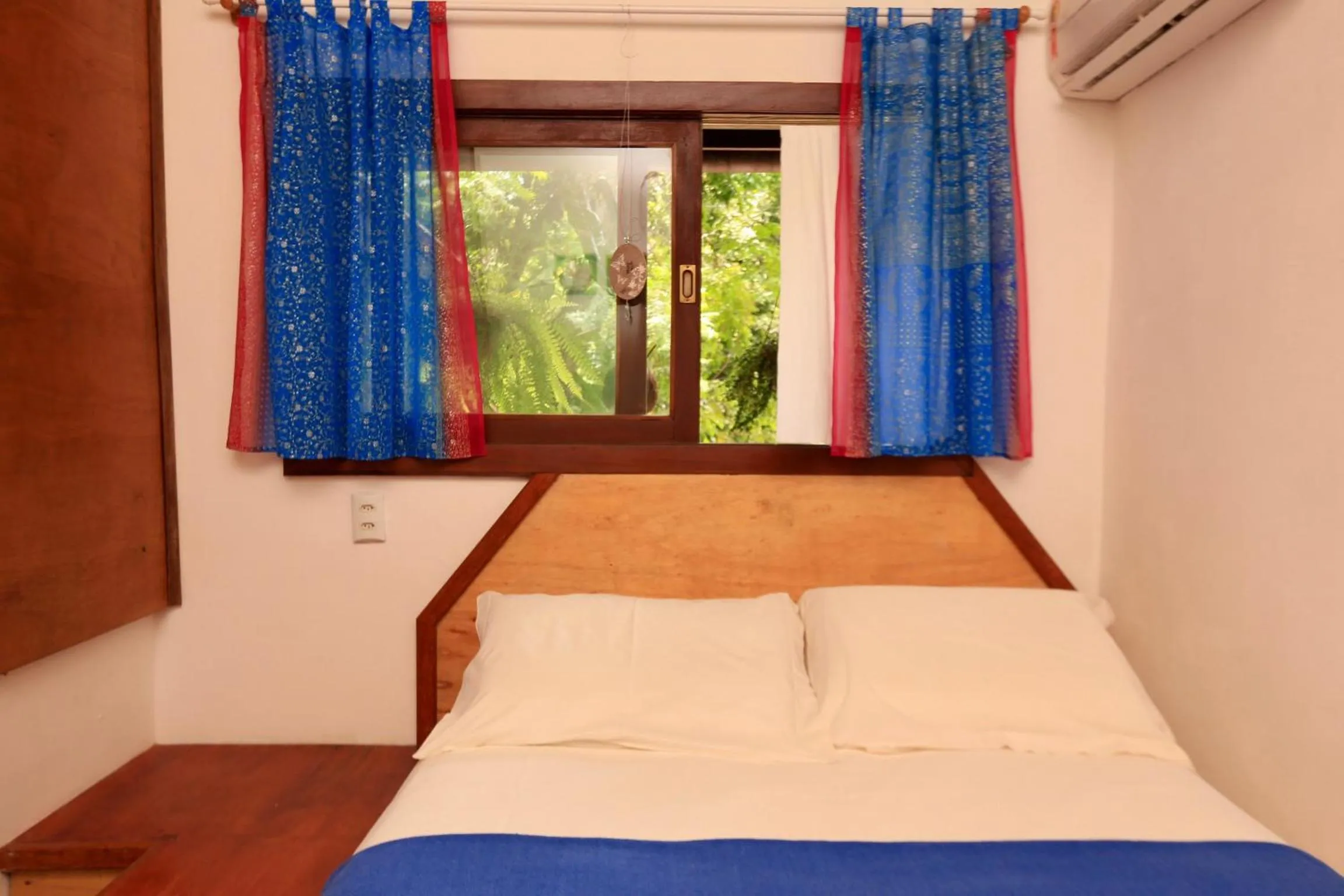 Bed in Recanto dos Pássaros Zen Apartamentos em meio de Natureza