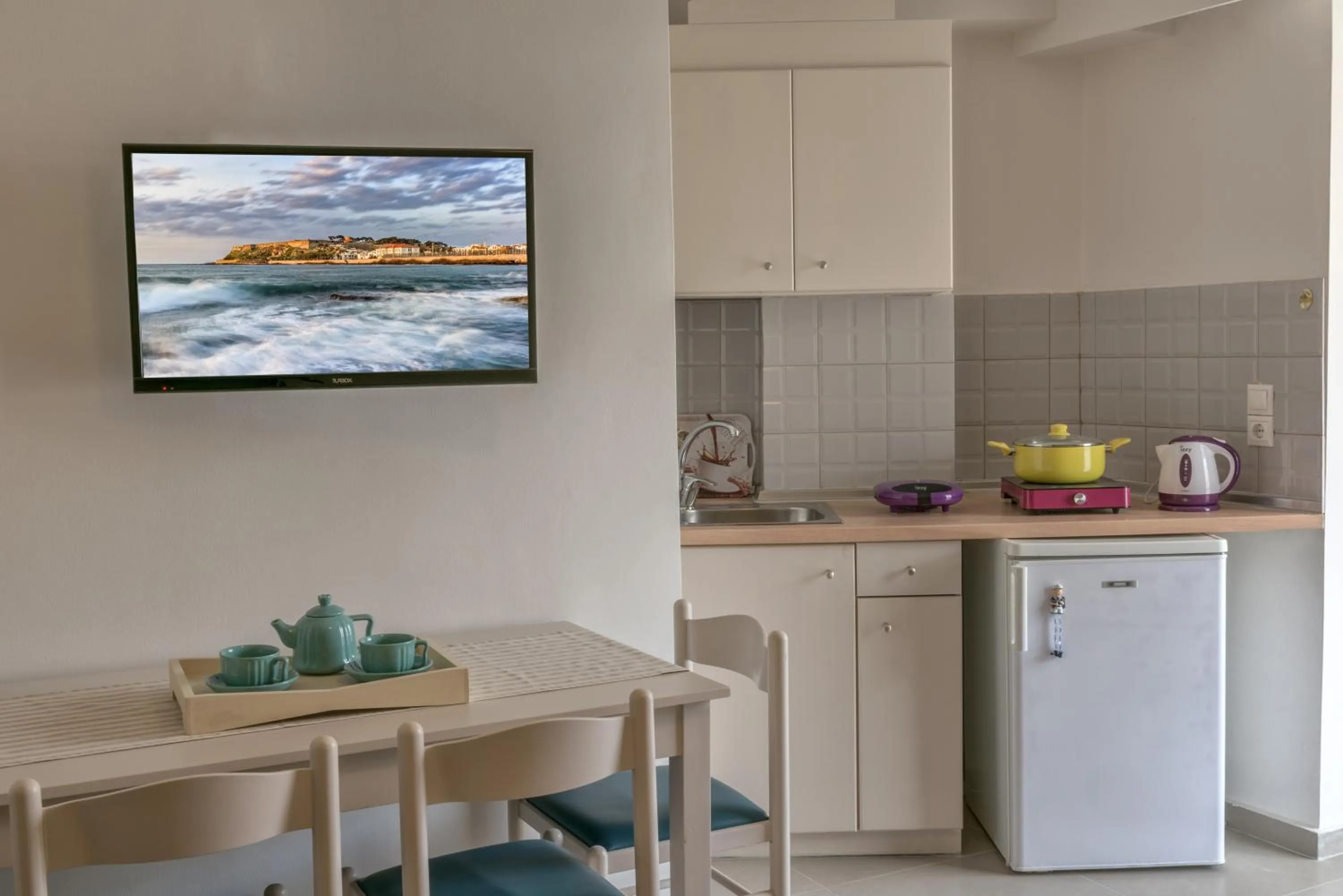 Kitchen or kitchenette in Aloe Apartments