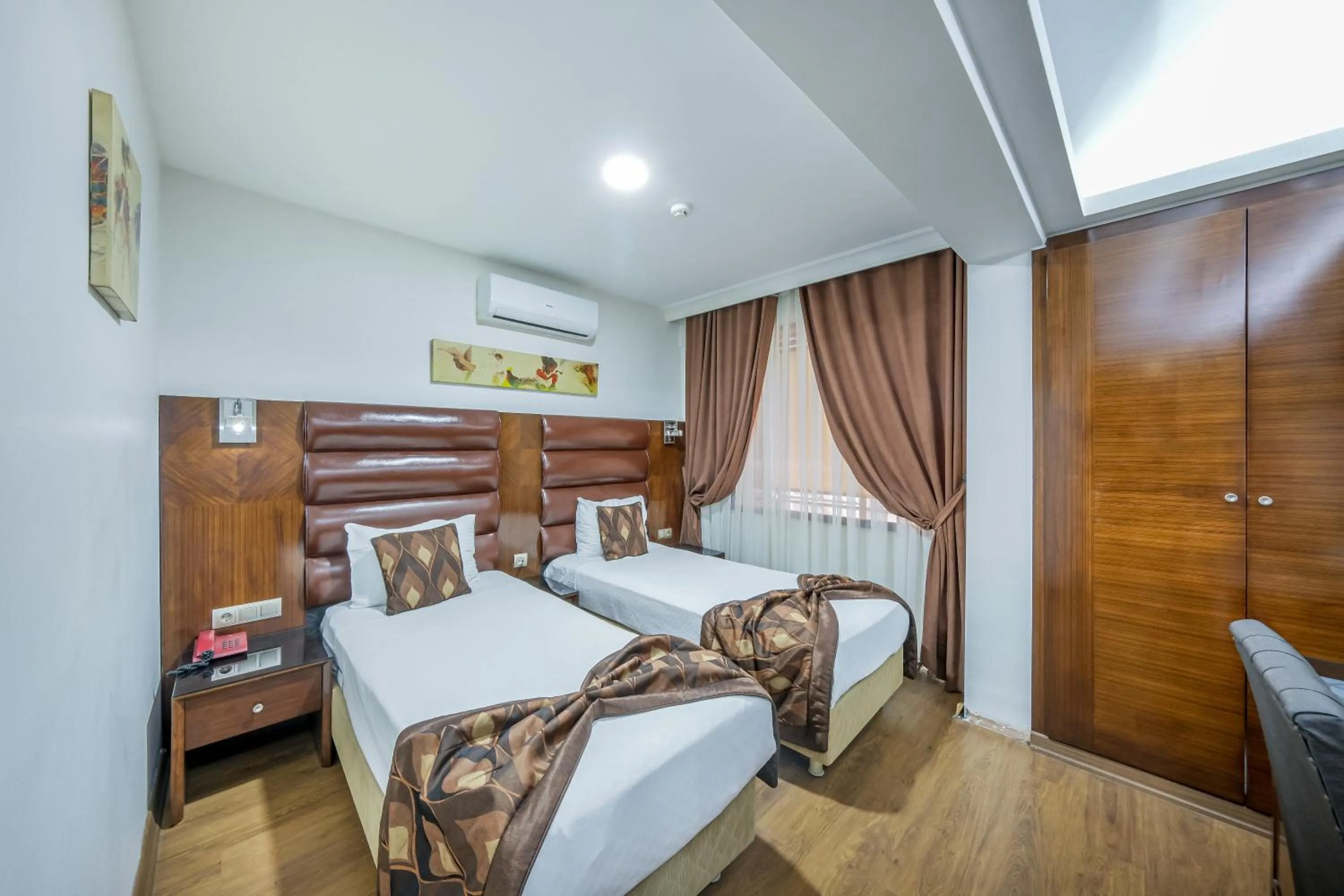 Bed in Marlight Boutique Hotel