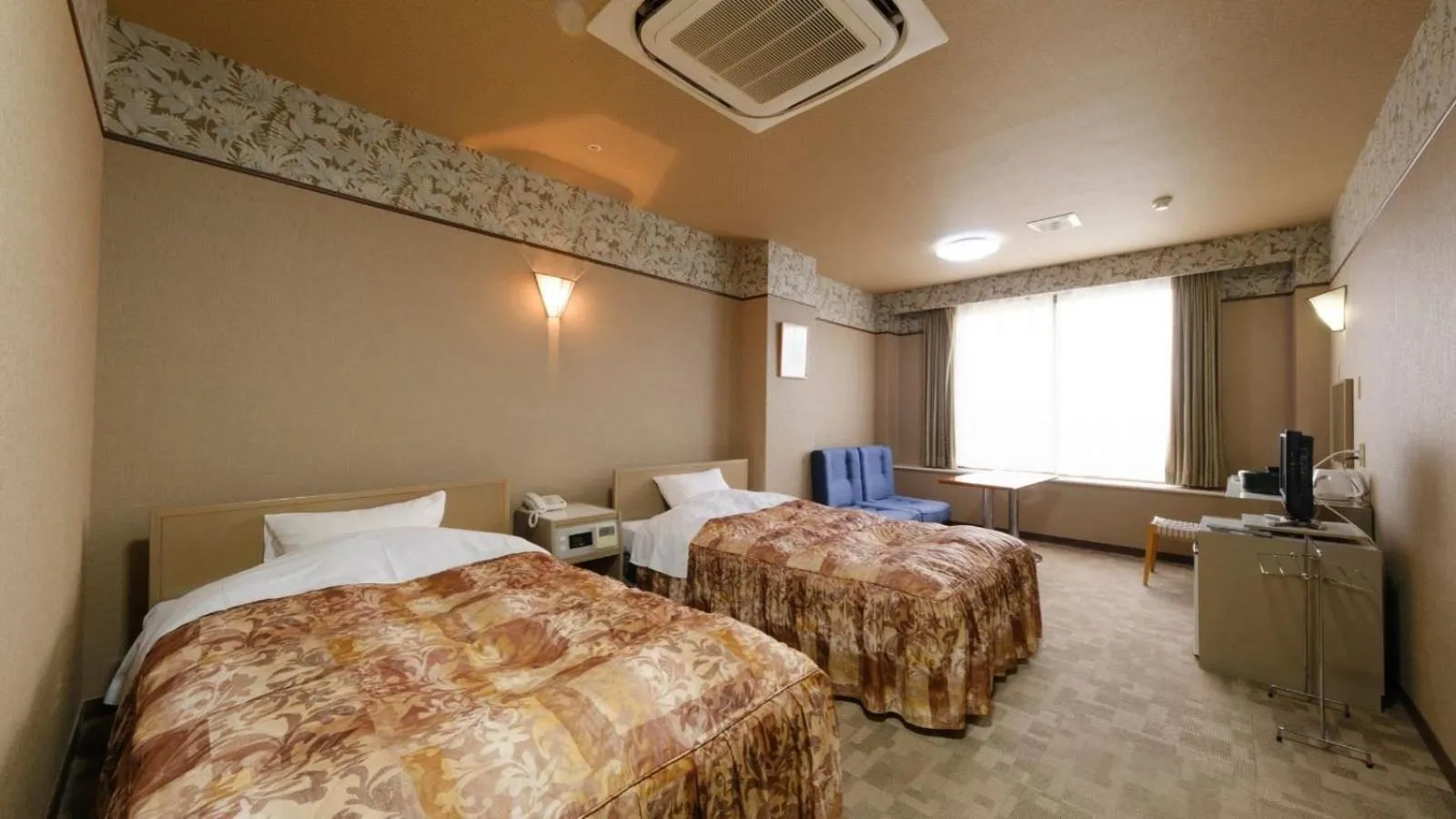 Bed in Sagayamato Onsen Hotel Amandi