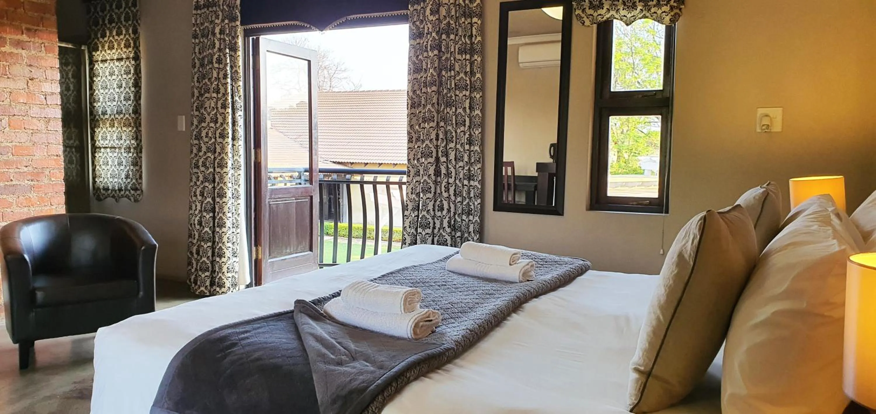 Balcony/Terrace, Bed in Accolades Boutique Venue