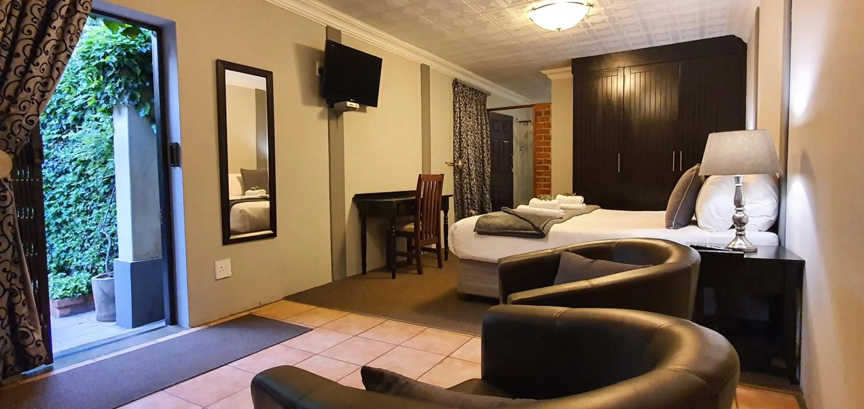 Photo of the whole room, Bed in Accolades Boutique Venue