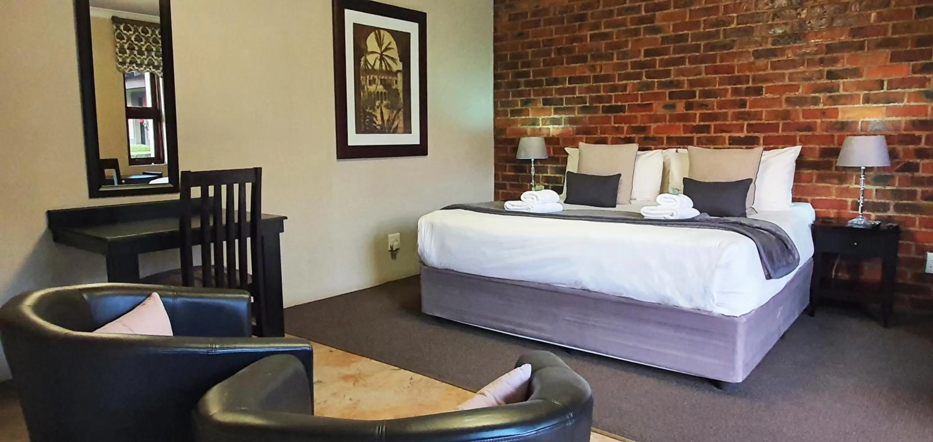 Photo of the whole room, Bed in Accolades Boutique Venue