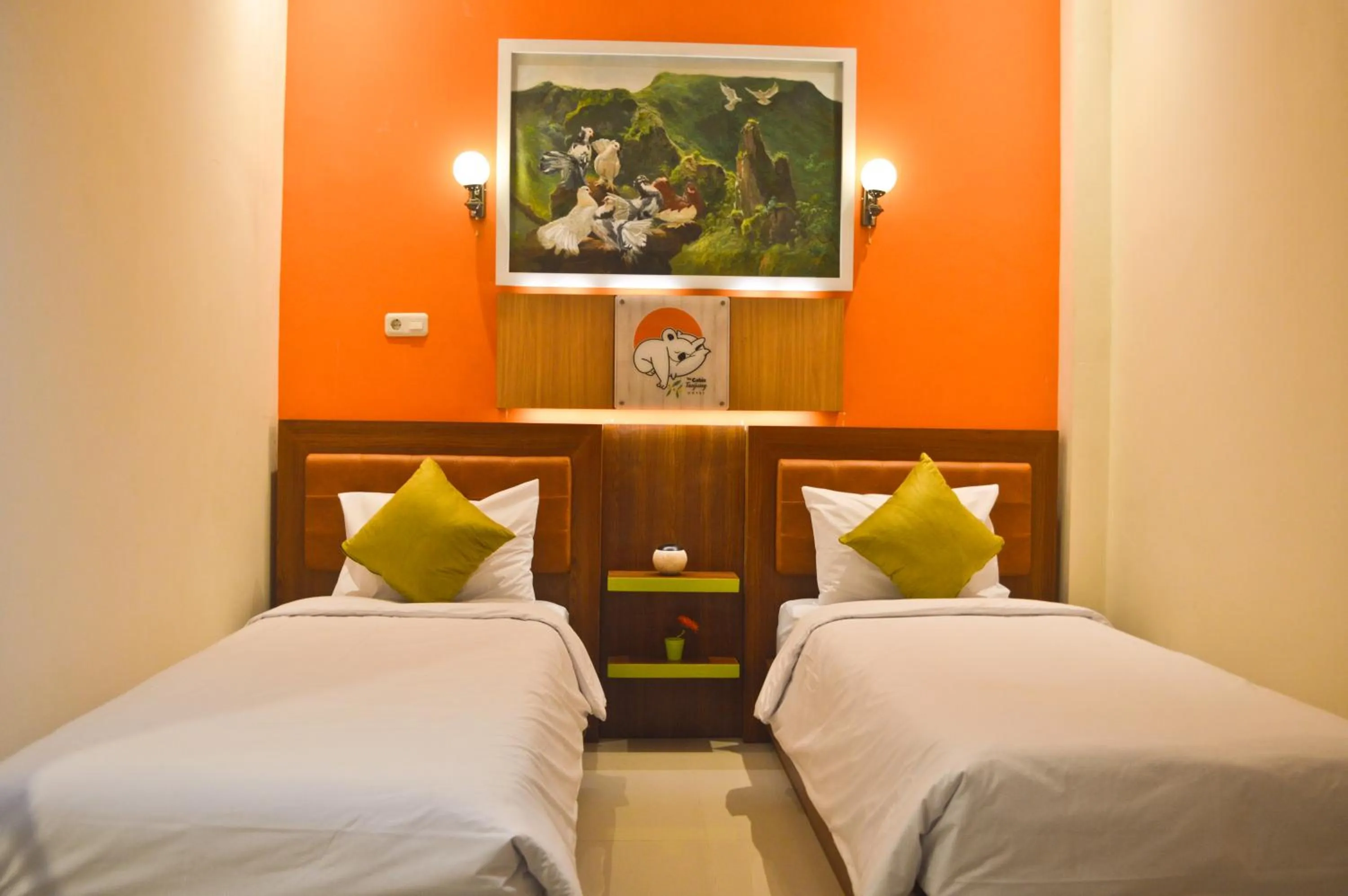 Bed in The Cabin Tanjung Hotel Wonosobo