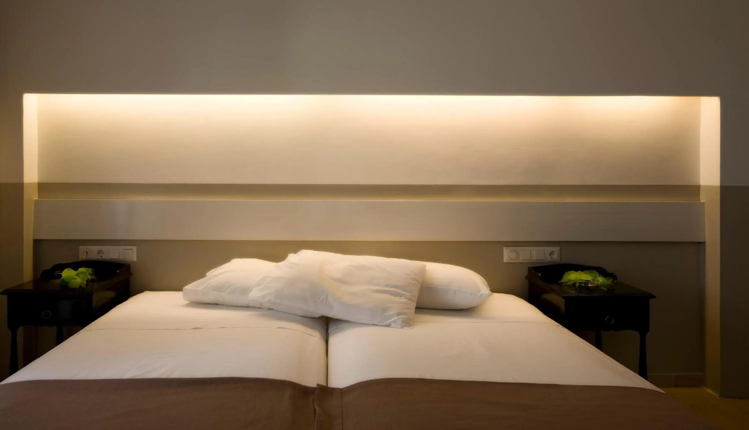 Bed in Kamari Beach Hotel Bed in Kamari Beach Hotel