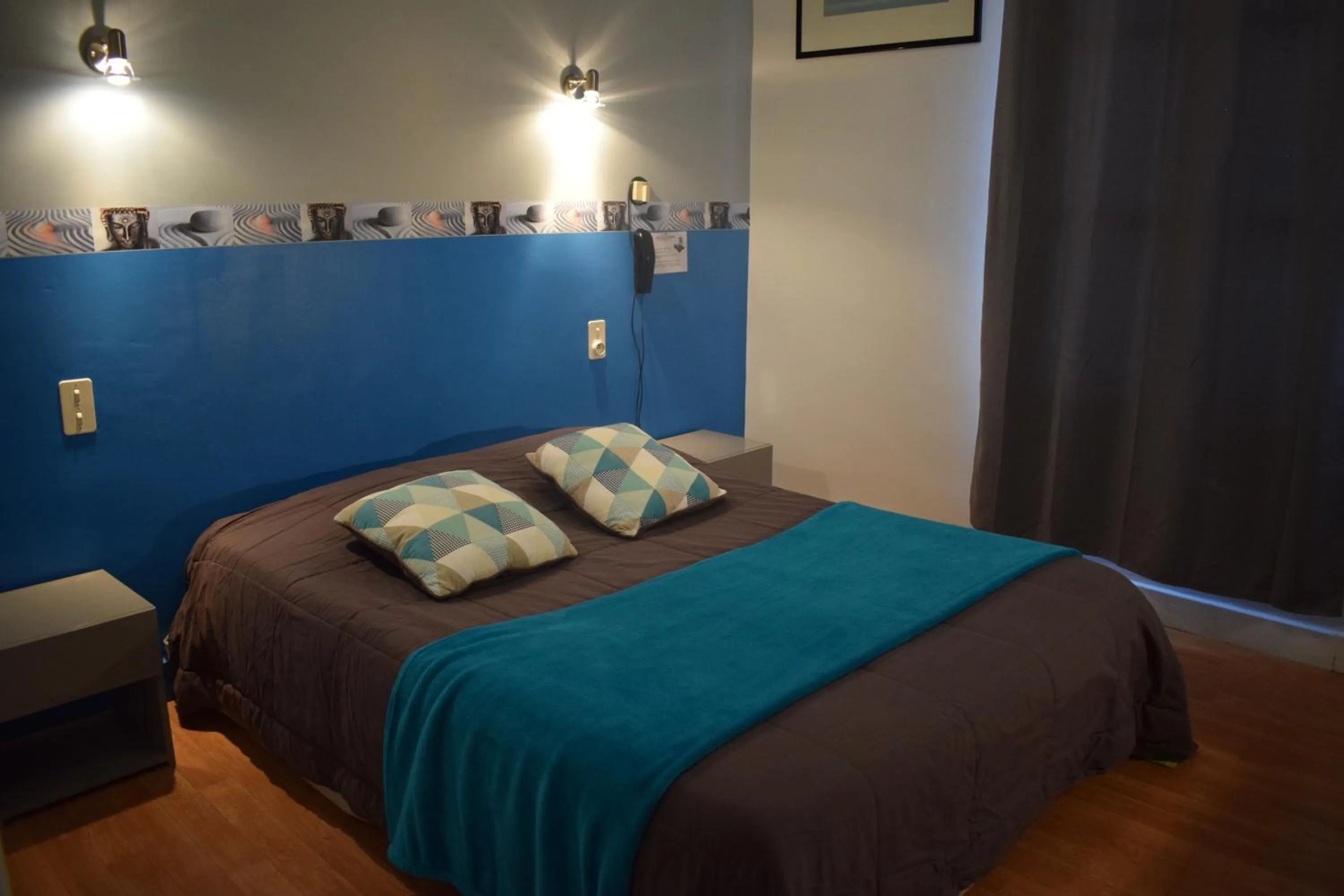 Photo of the whole room, Bed in Hôtel du Commerce