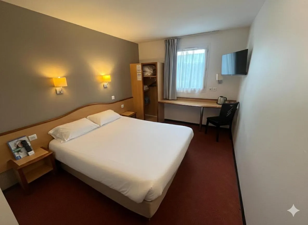 Bed in Brit Hotel Confort Montauban