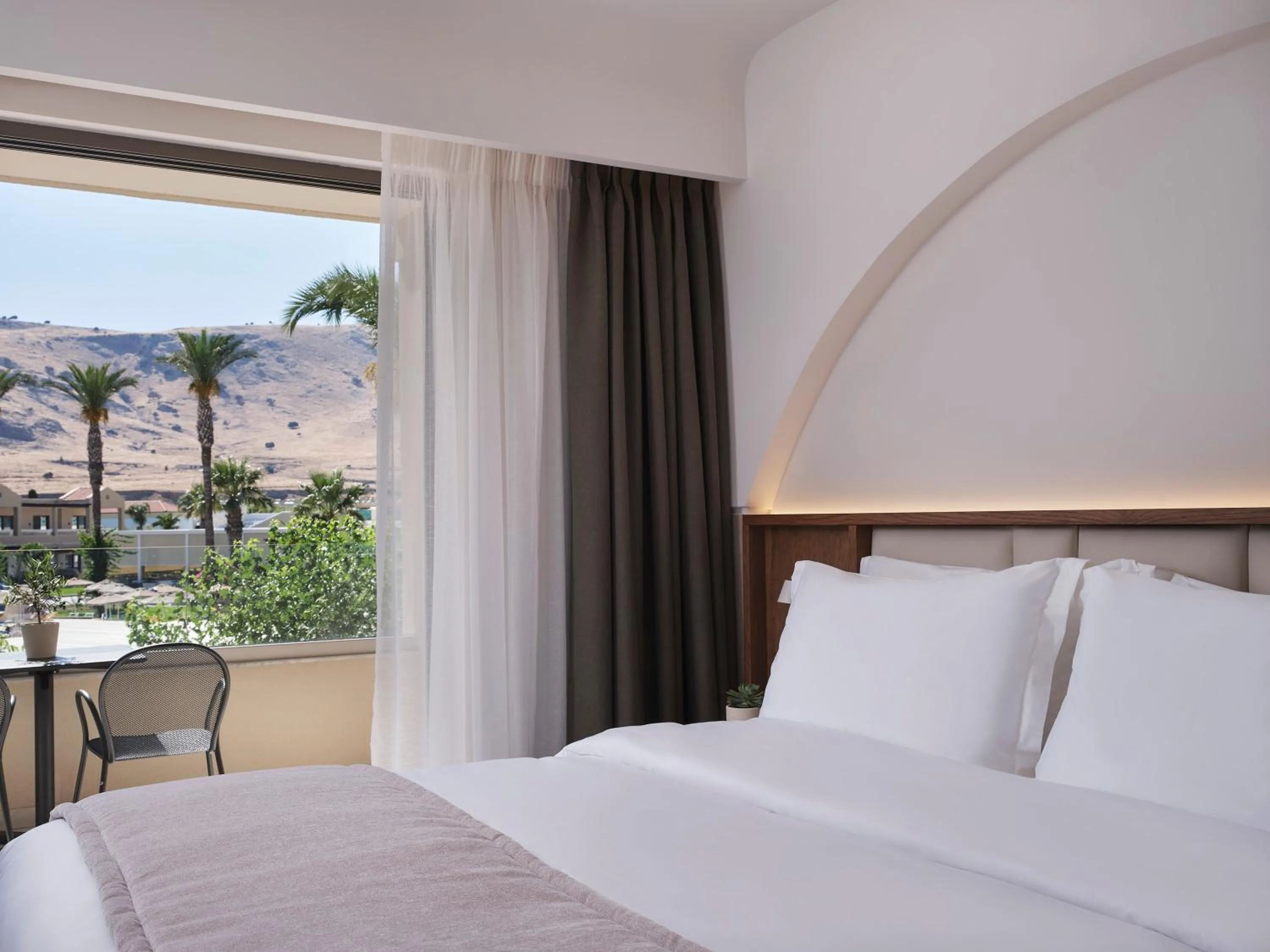 Bed in Lindos Princess Beach Hotel