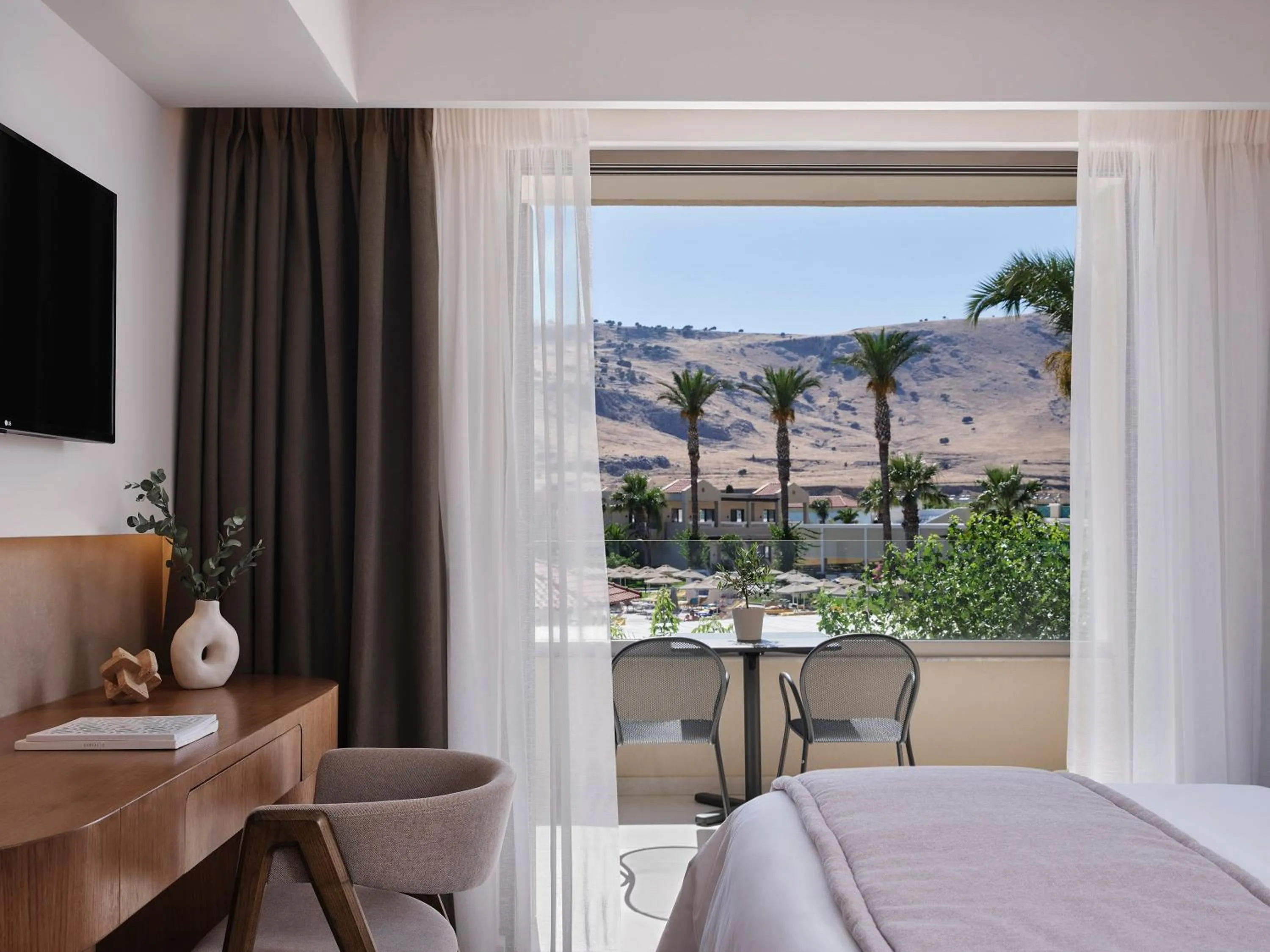 Bed in Lindos Princess Beach Hotel