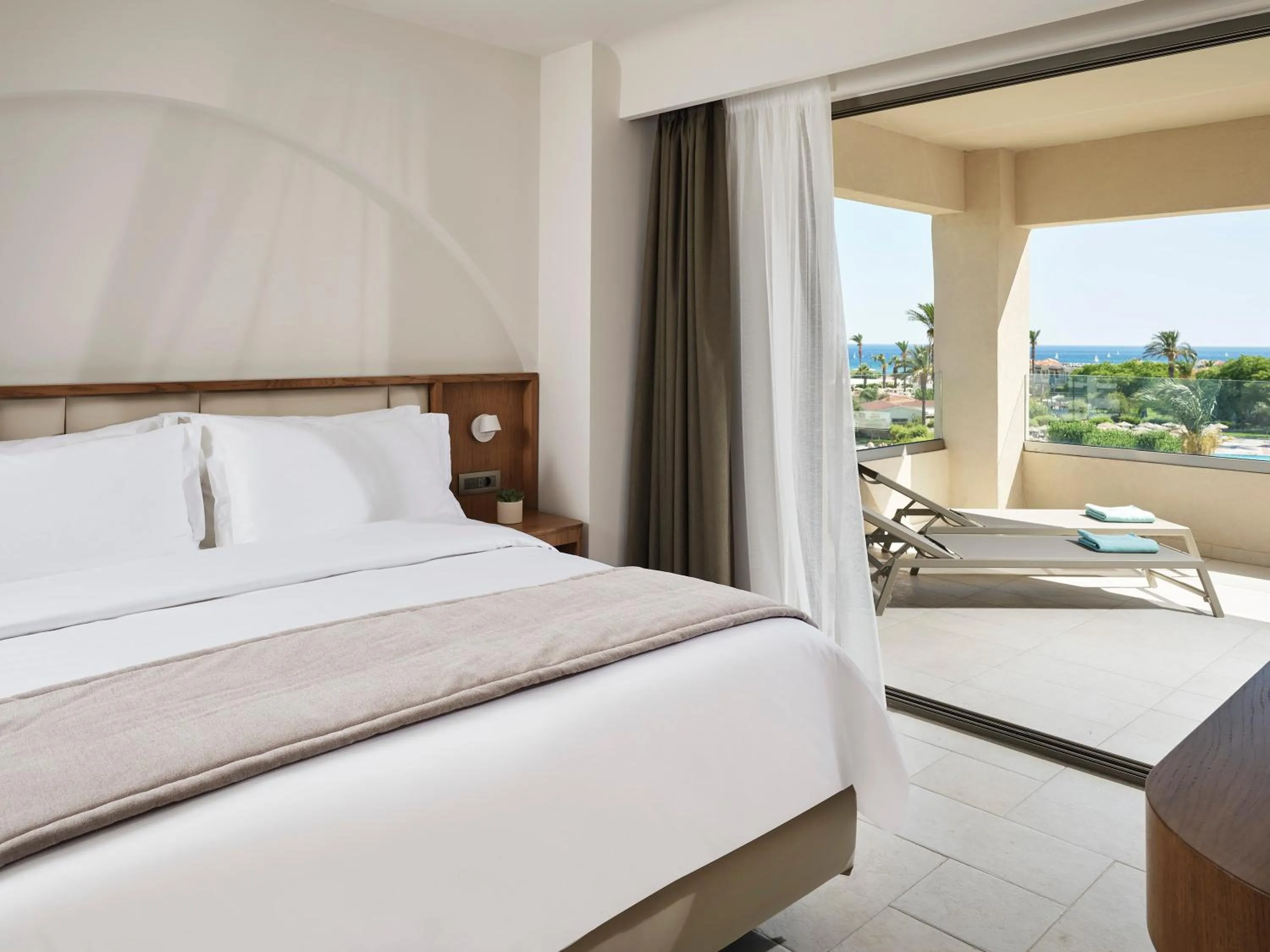 Bed in Lindos Princess Beach Hotel