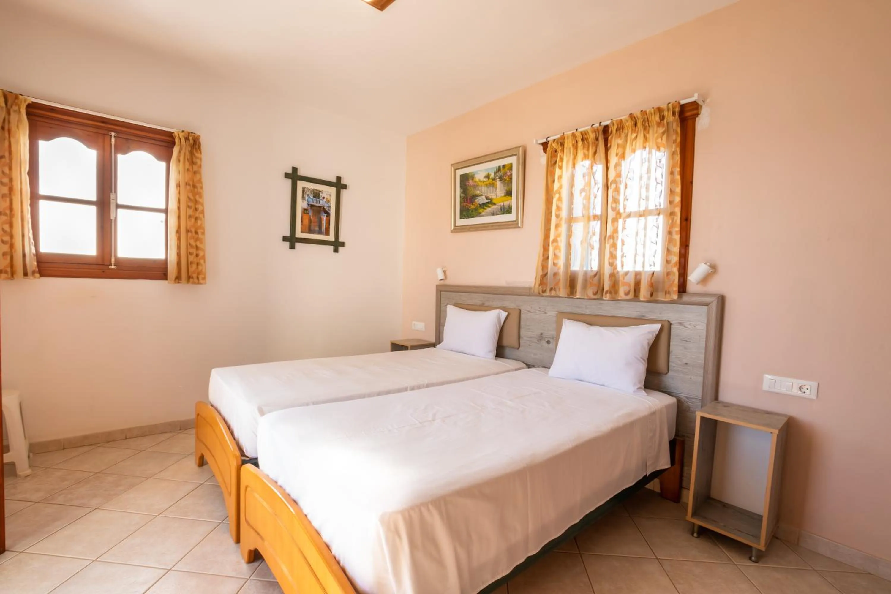 Bed in Arhontiko Hotel