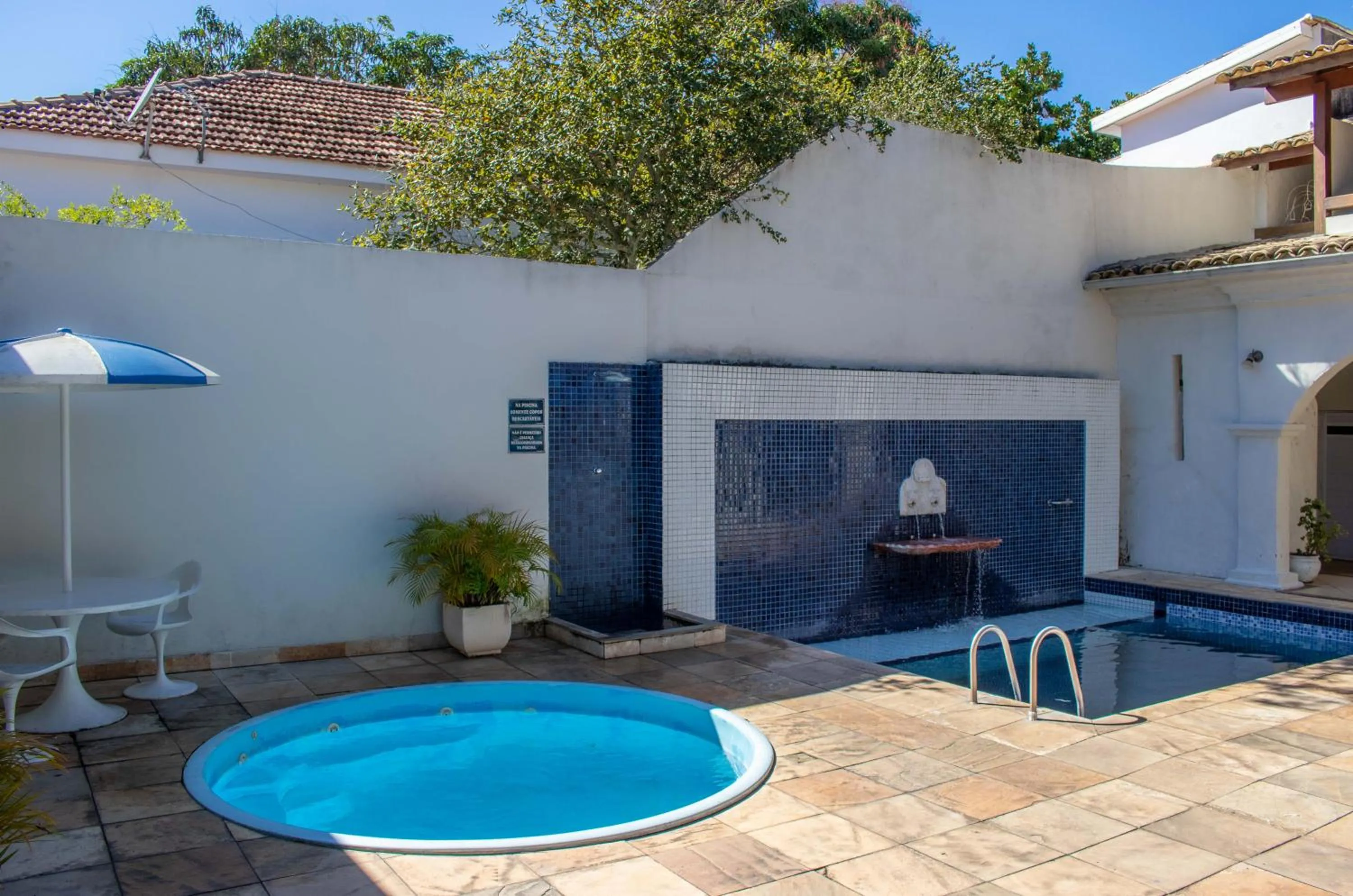 Swimming pool in Pousada Boulevard