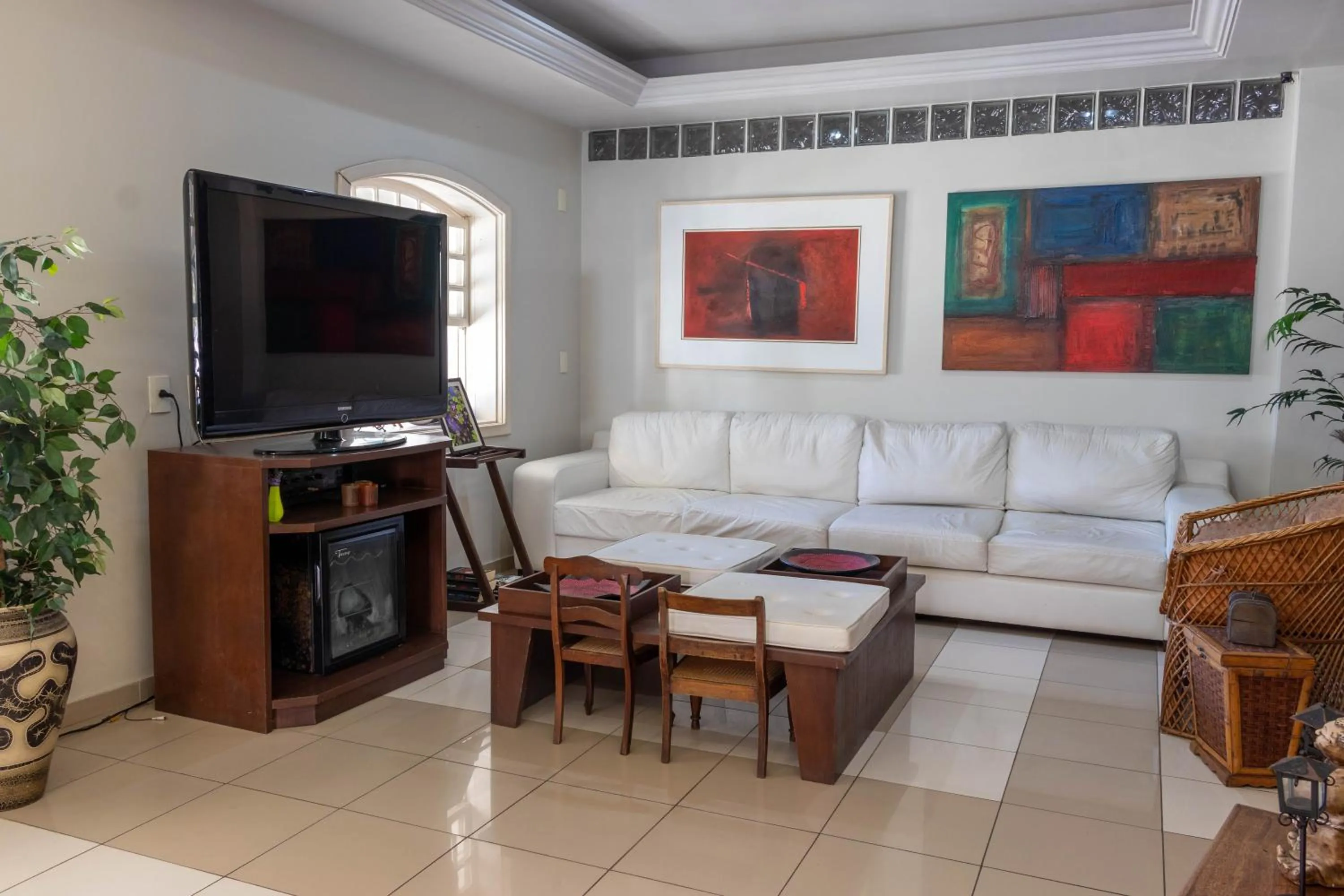 Communal lounge/ TV room in Pousada Boulevard