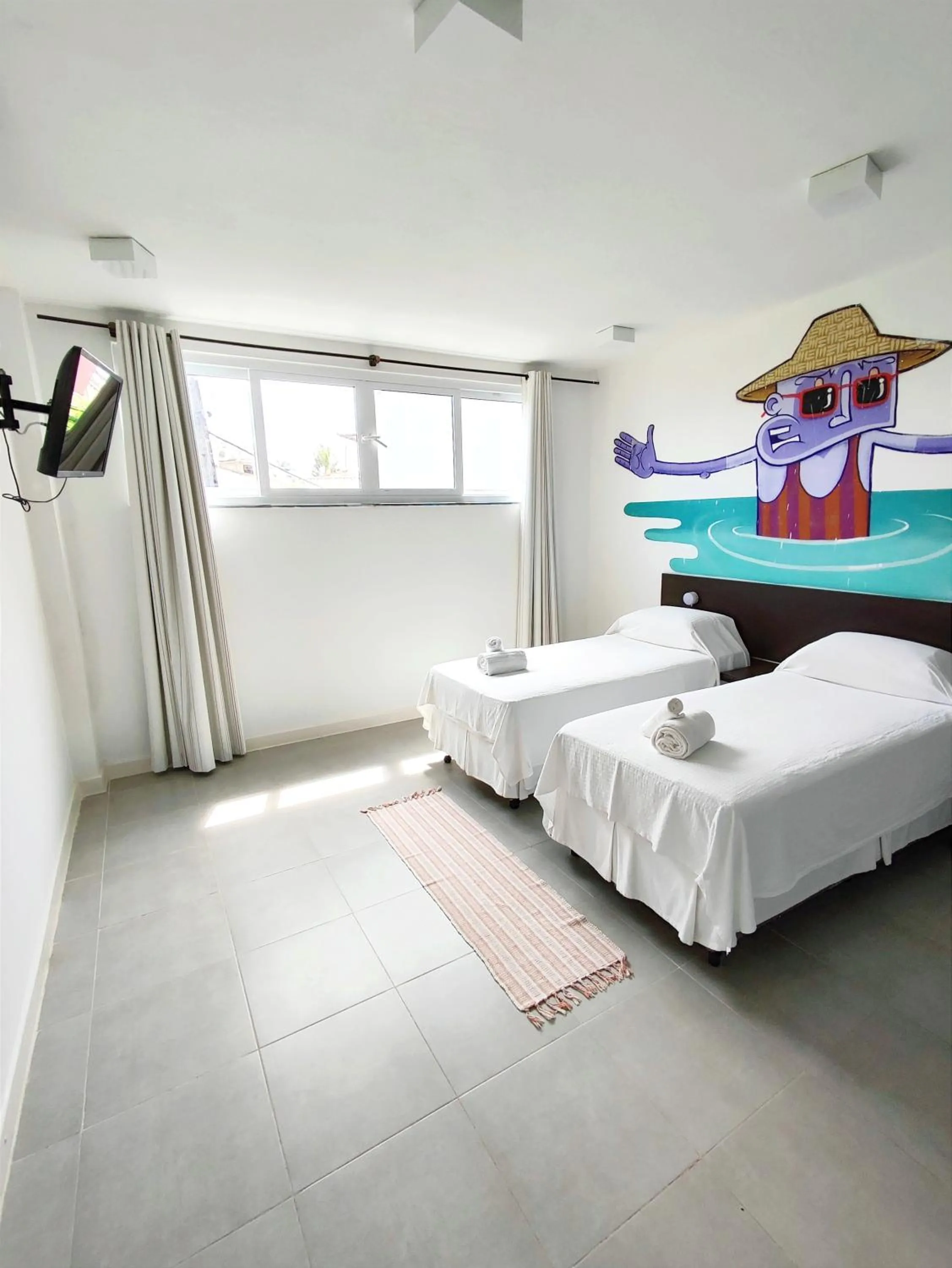 Bed in Villa dos Graffitis Pousada