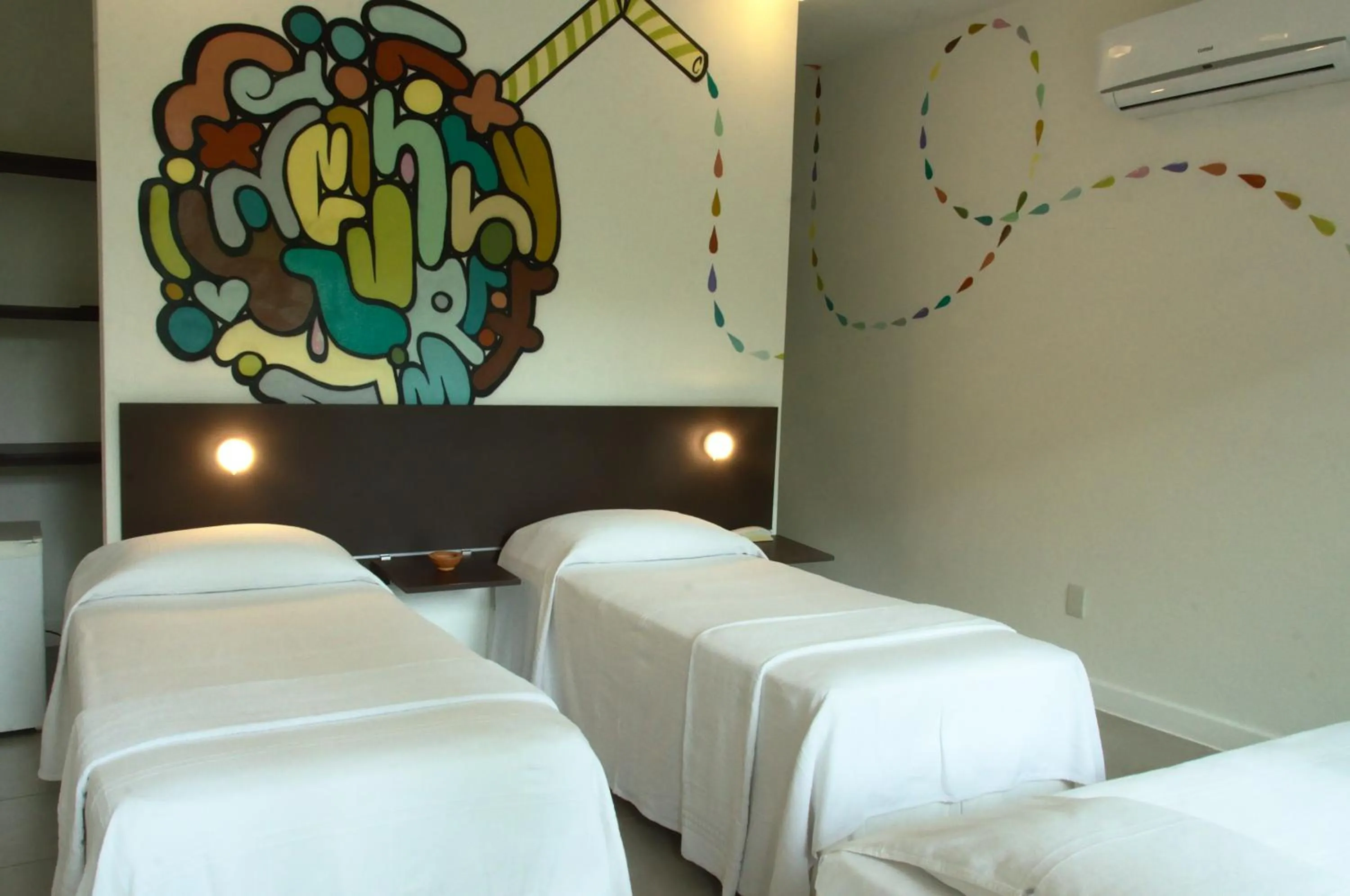 Bed in Villa dos Graffitis Pousada