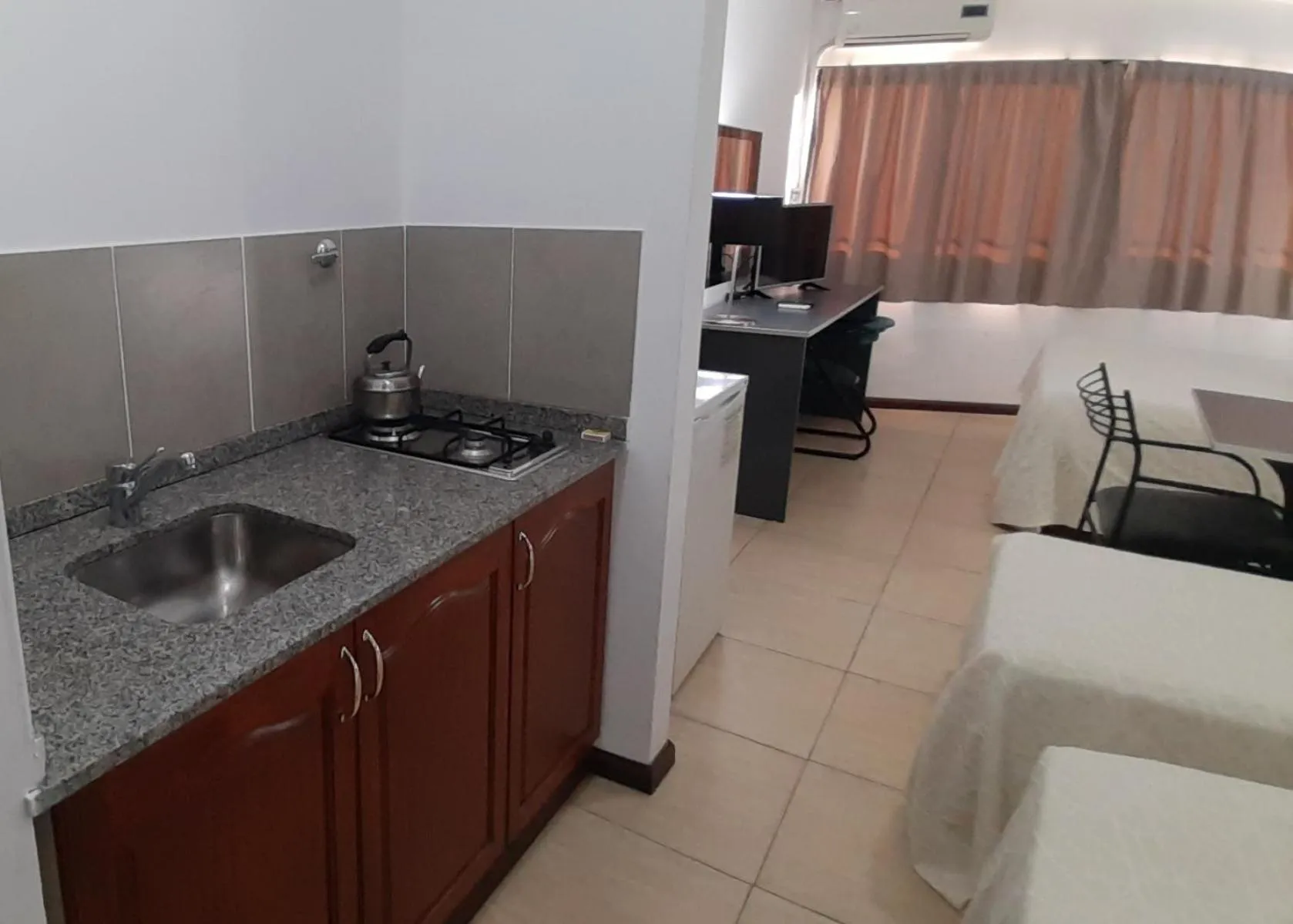 Photo of the whole room in Apart Hotel Alvear