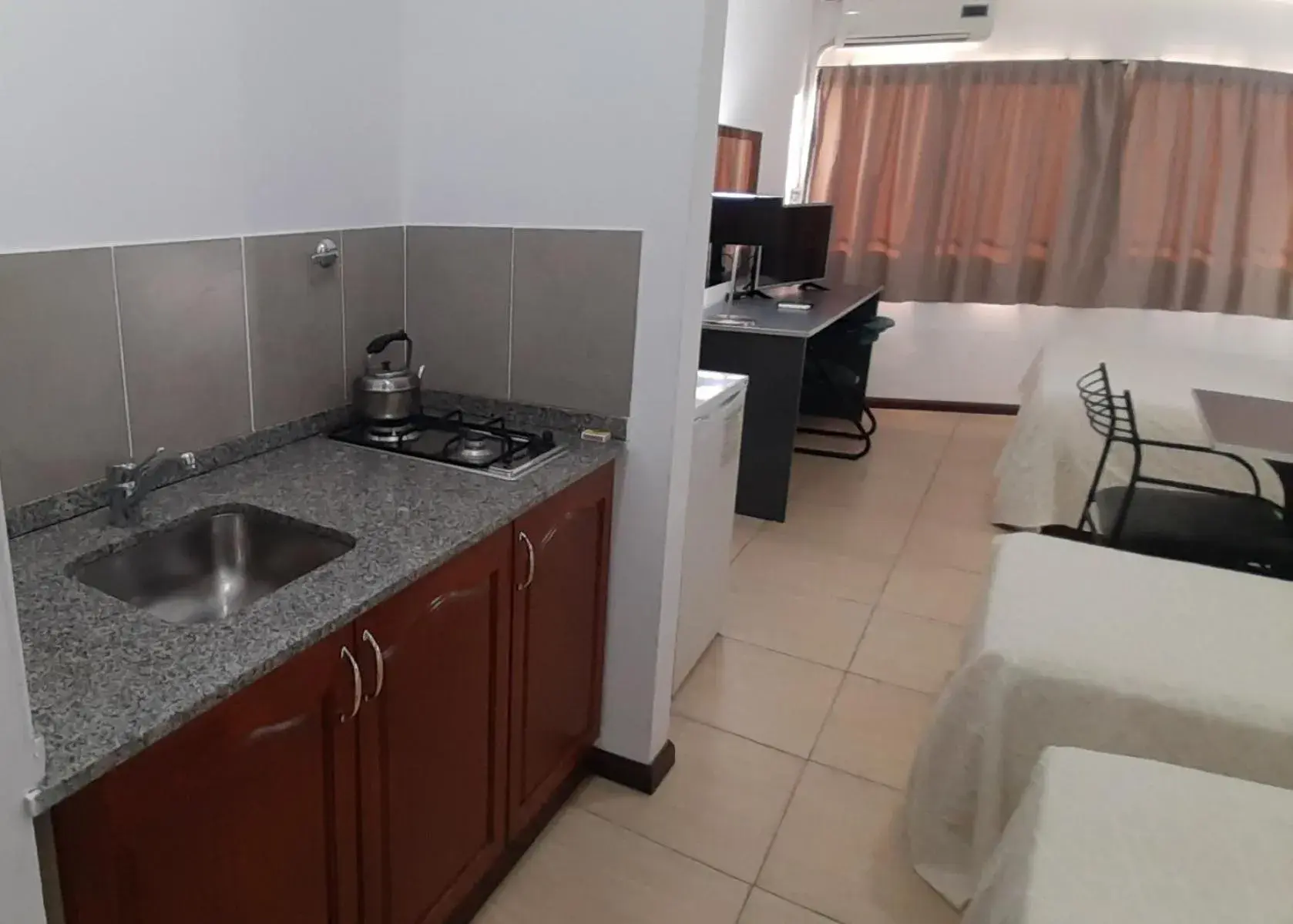 Photo of the whole room in Apart Hotel Alvear Photo of the whole room in Apart Hotel Alvear