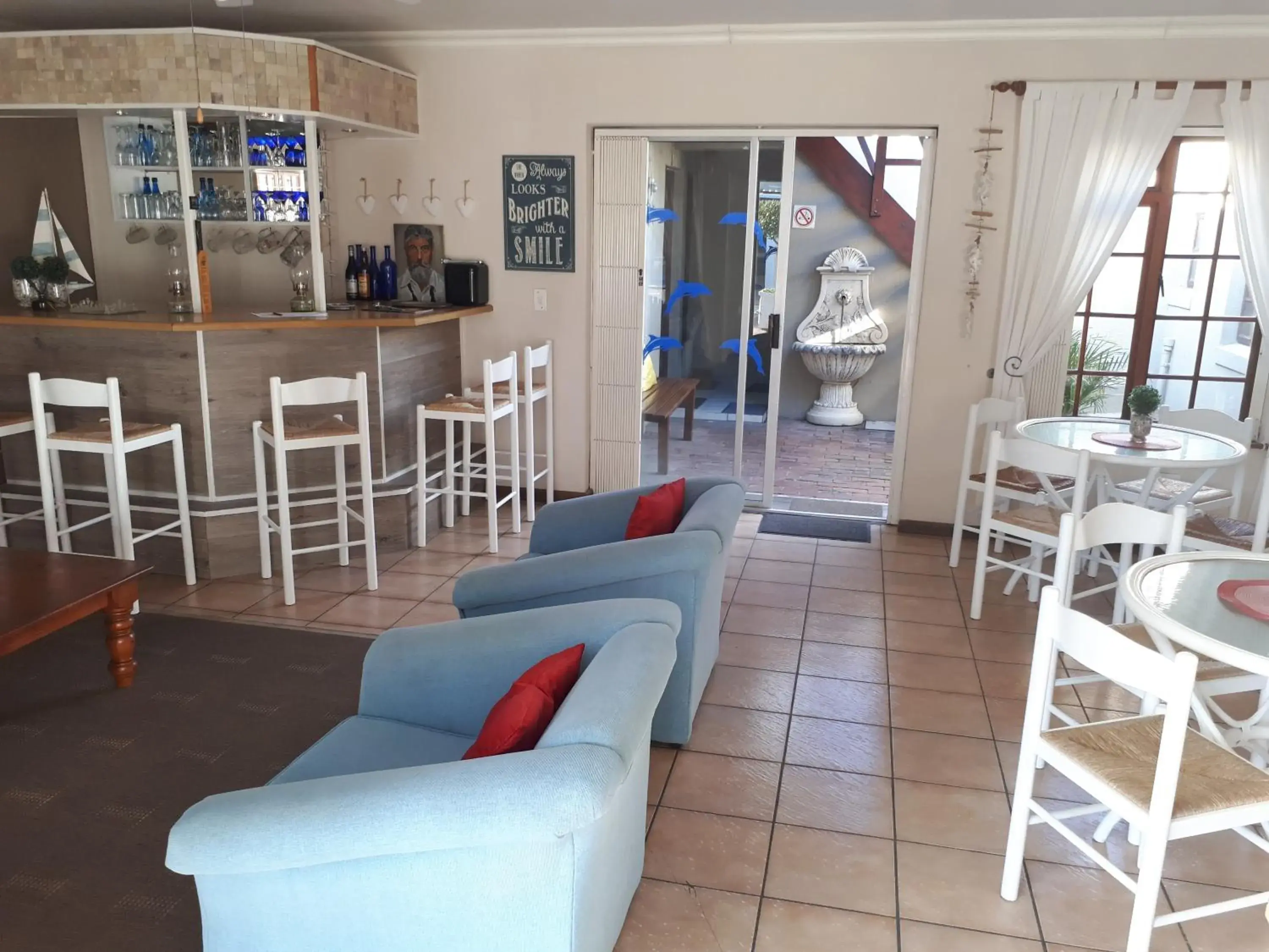 Lounge or bar in Dolphin Inn Blouberg Lounge or bar in Dolphin Inn Blouberg