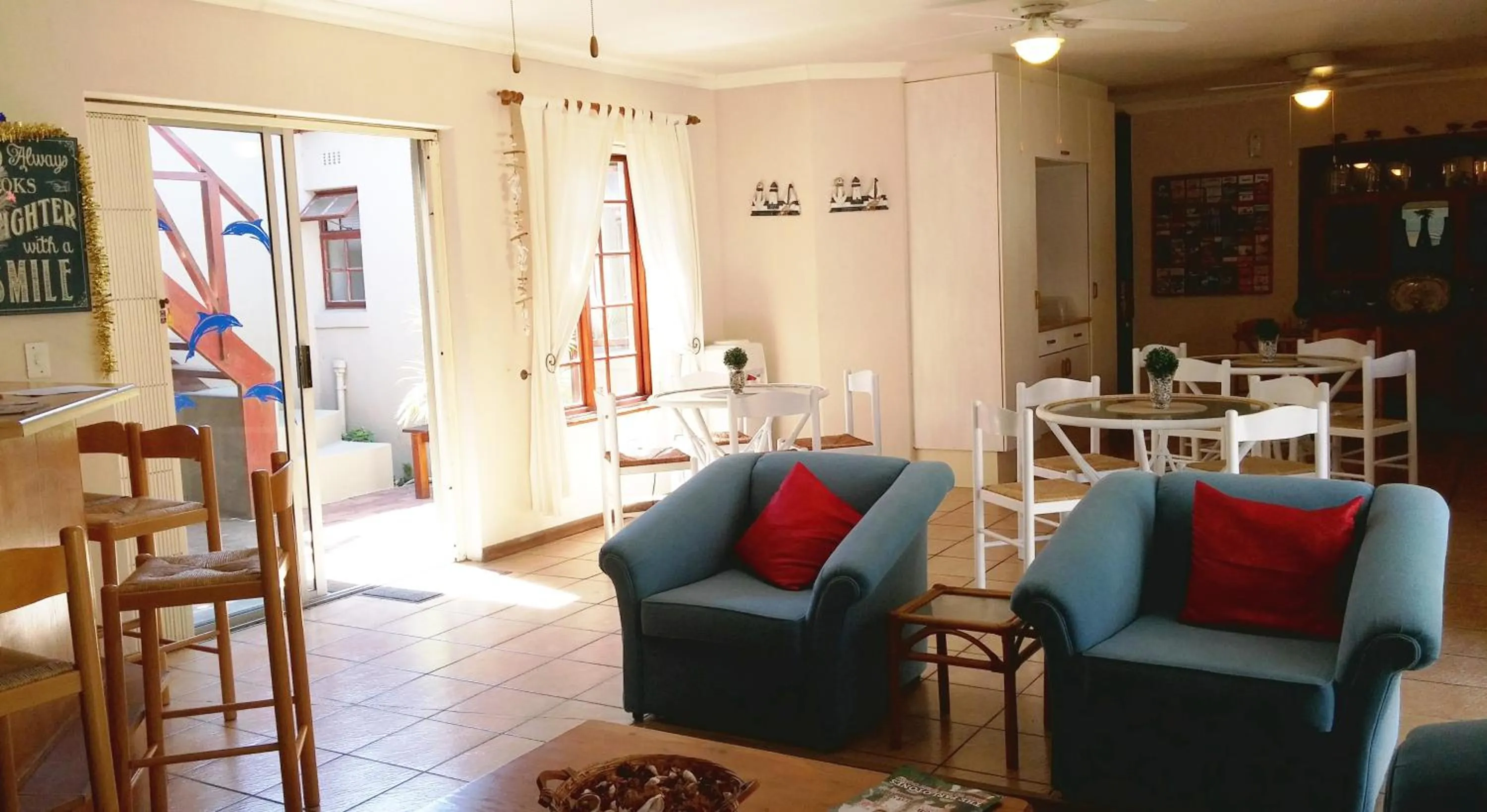 Communal lounge/ TV room in Dolphin Inn Blouberg
