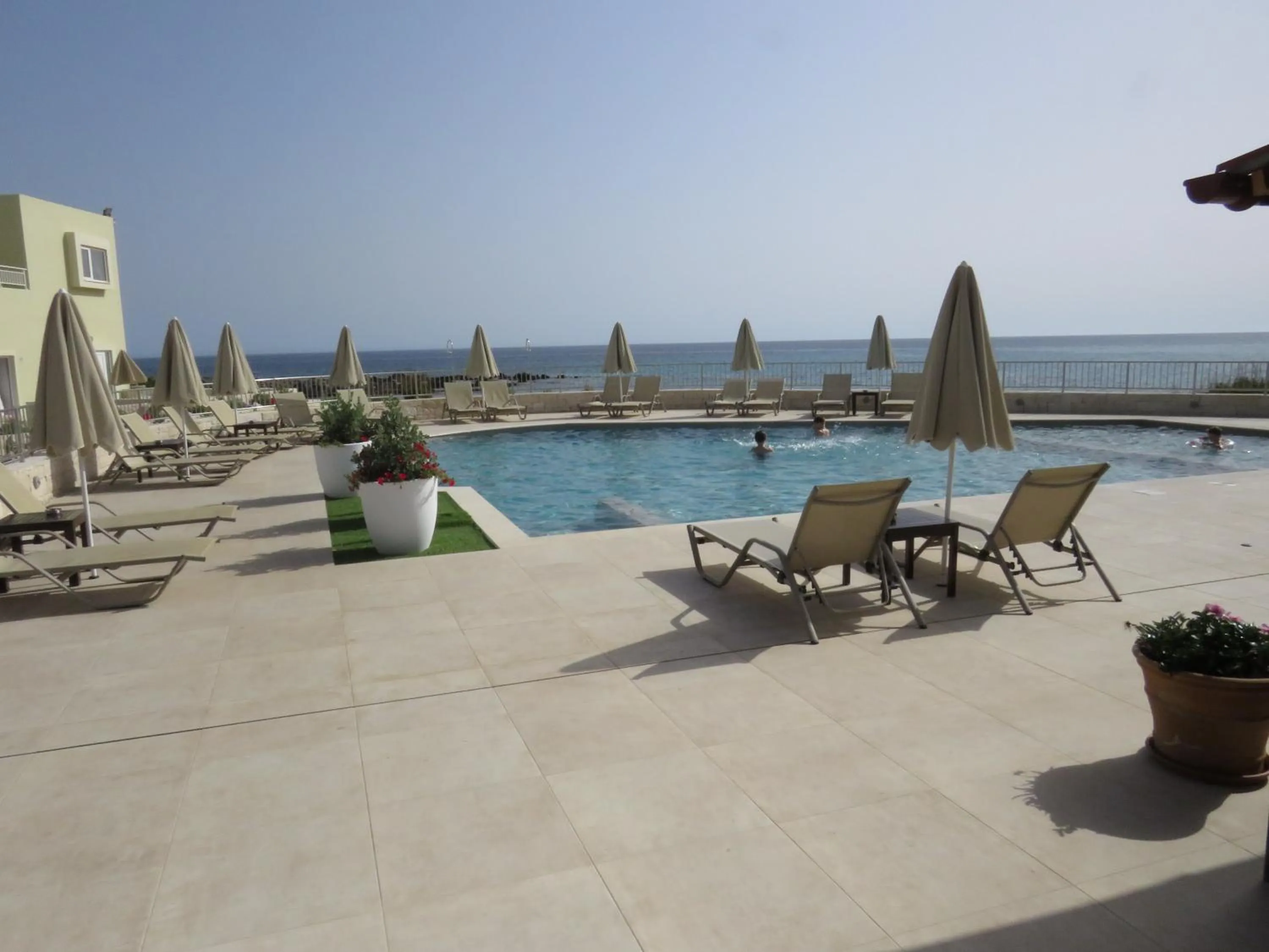 Swimming pool in Blue Beach Villas Apartments