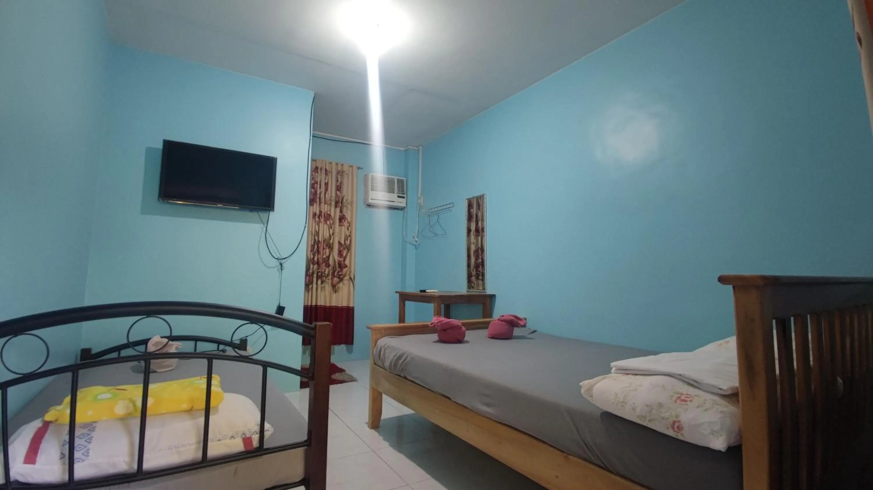 Bed in R & R (Rest & Relax) Guesthouse