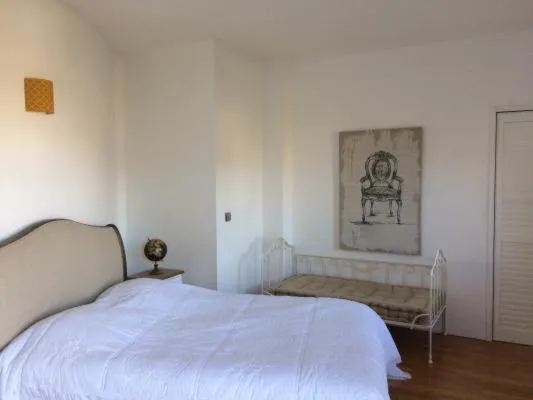 Bed in CoTTAGE LA VILLA BOLERO